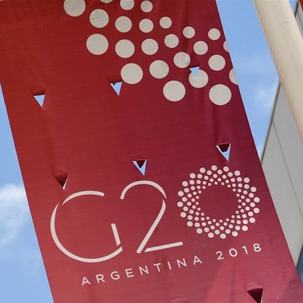 <p>A jet liner flies over the G20 summit venue at the Costa Salguero Center in Buenos Aires</p>
