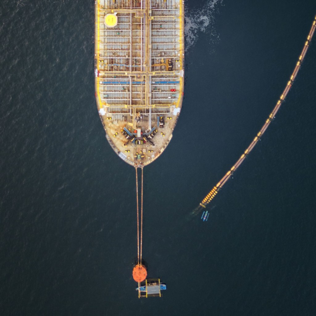 In an aerial view, the Panamanian-flagged Tiger Wings, carrying crude oil from Russia, is moored off the Petron oil refinery on April 1, 2026 in Limay, Bataan province, Philippines.