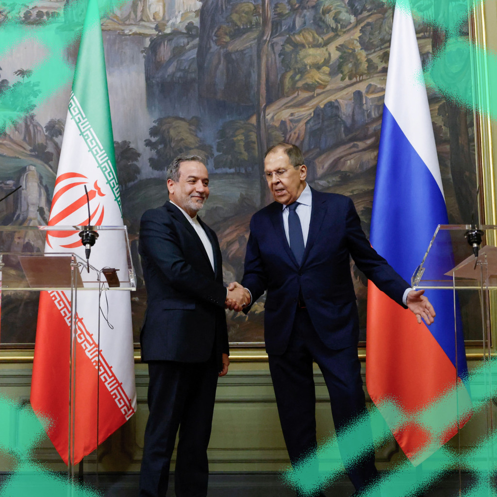 Russia's Foreign Minister Sergei Lavrov and Iran's Foreign Minister Abbas Araqchi shake hands during a press conference following their talks in Moscow, Russia on April 18, 2025.