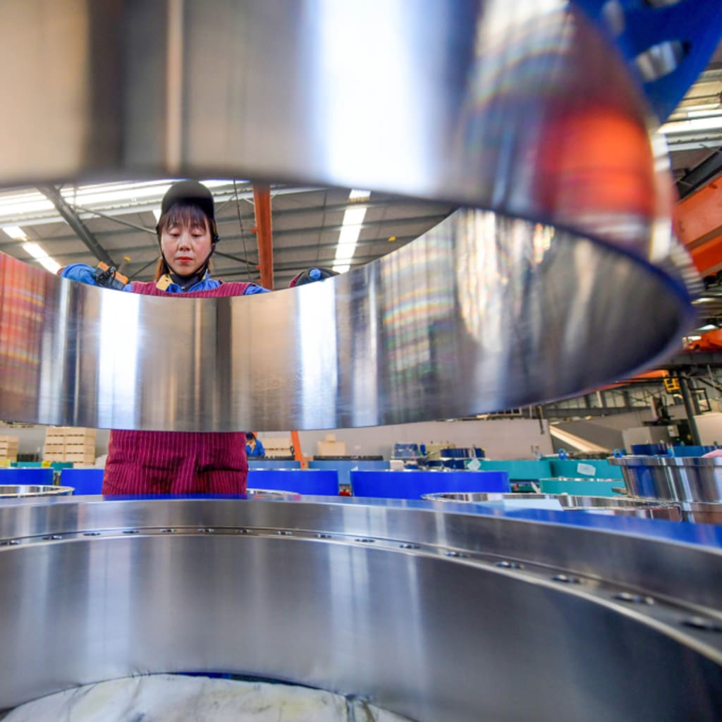 Workers Manufacture Wind Turbine Locking Disc In Luoyang