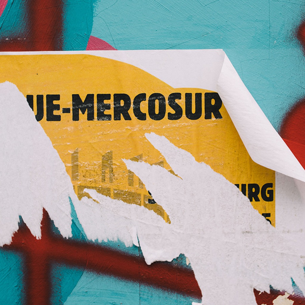 A poster about Mercosur is torn down in a street in Strasbourg, France.