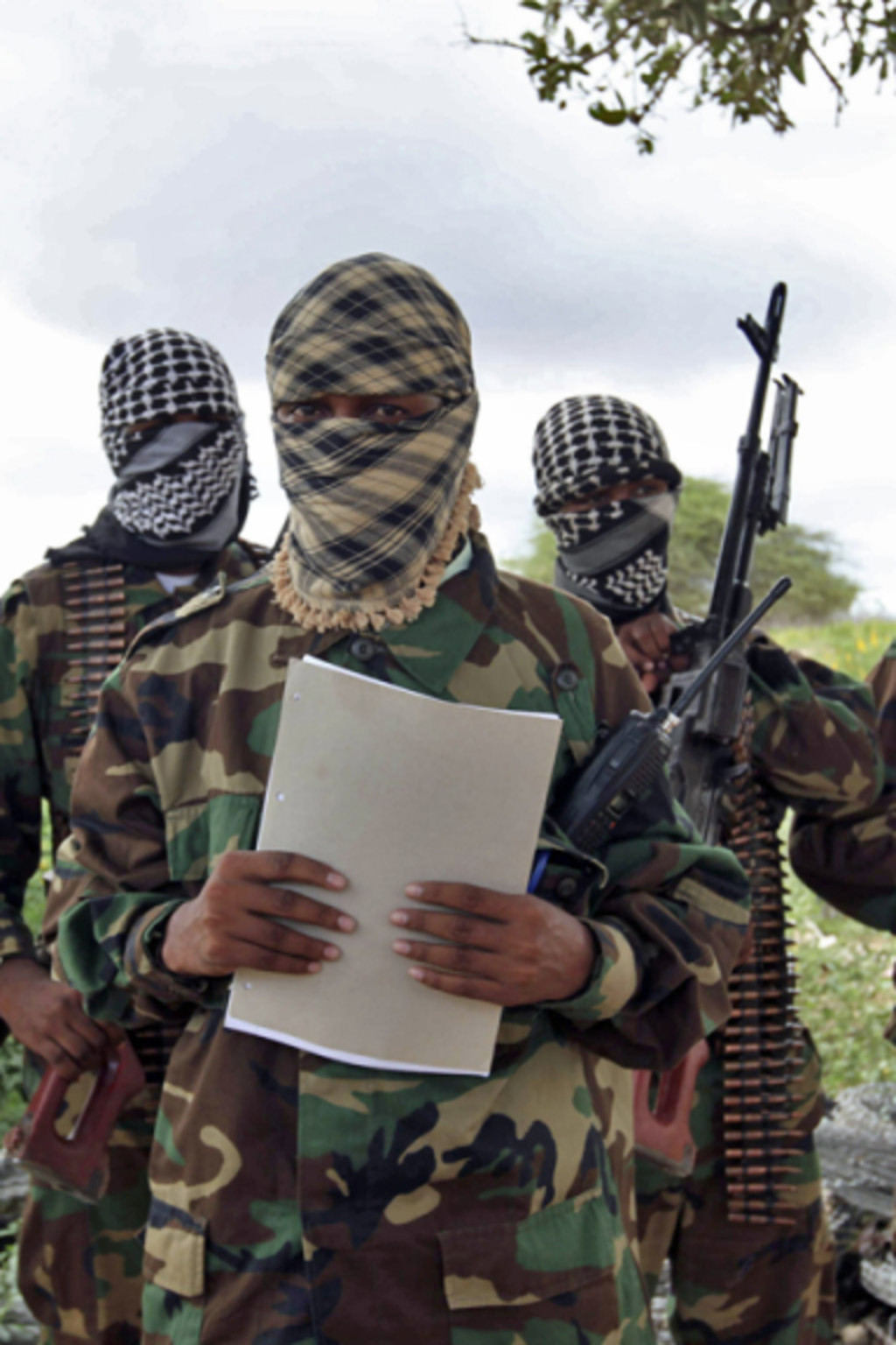<p>A military spokesperson for al-Shabaab issues a statement from south of Mogadishu. </p>
