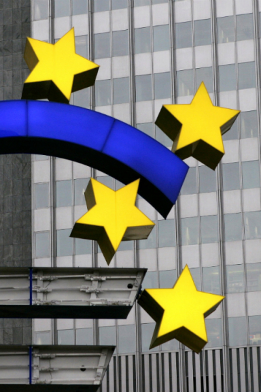 <p>Workers repair the euro sign in front of the European Central Bank headquarters in Germany.</p>