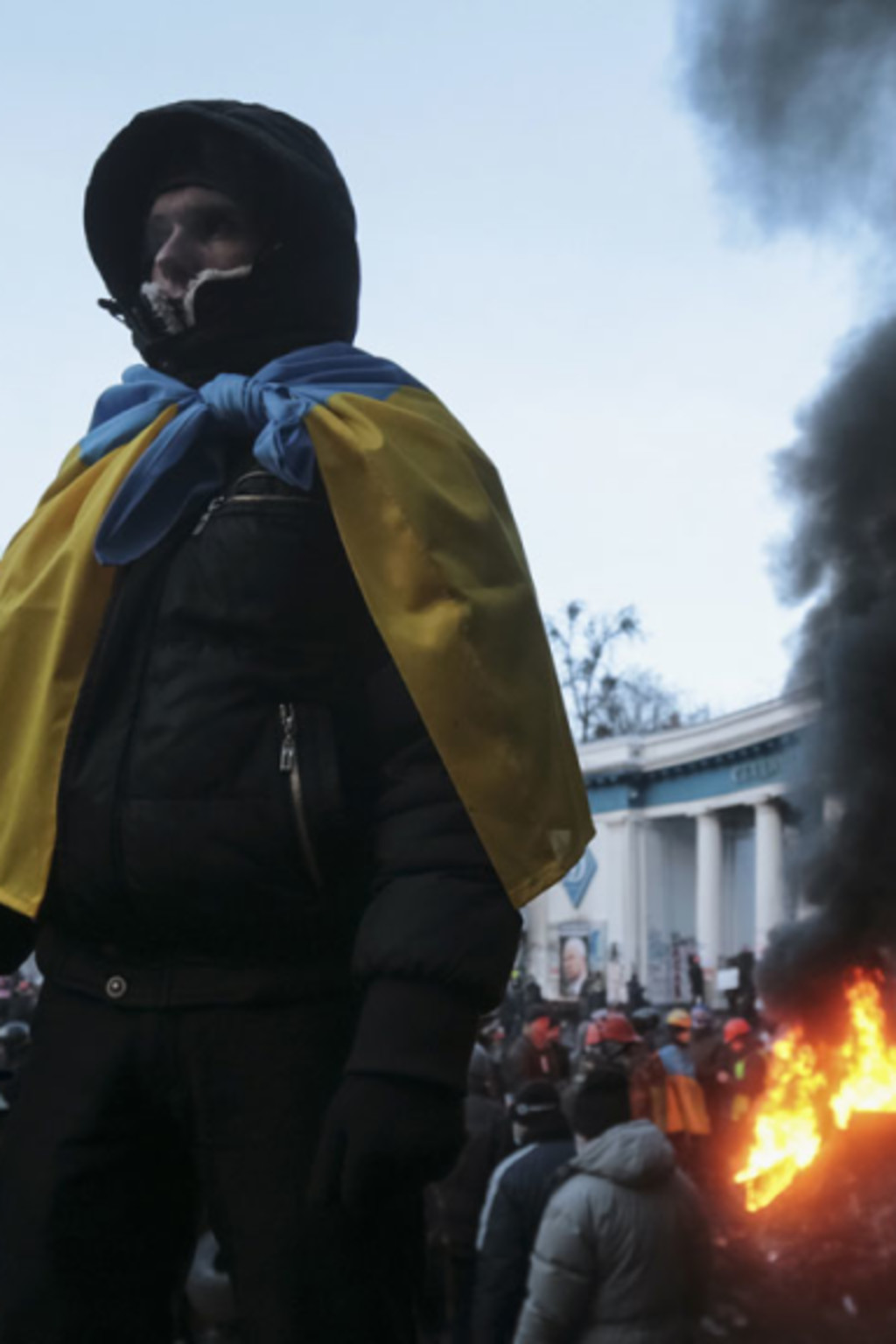 <p>Anti-government protesters at a barricade in Kiev, January 25, 2014.</p>
