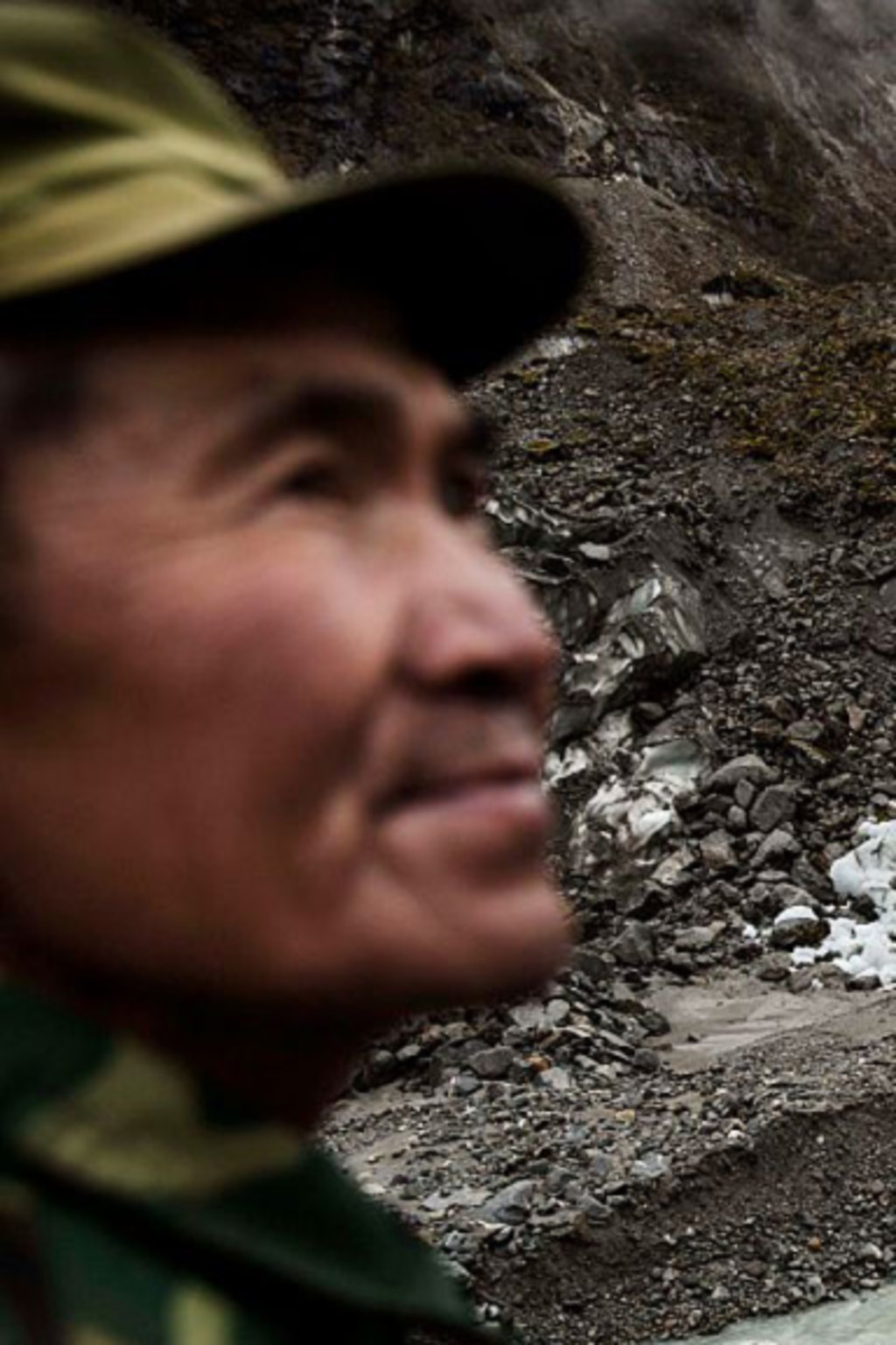<p>A villager stands near one of China’s monsoonal glaciers in Hailuogou, November 11, 2015.</p>