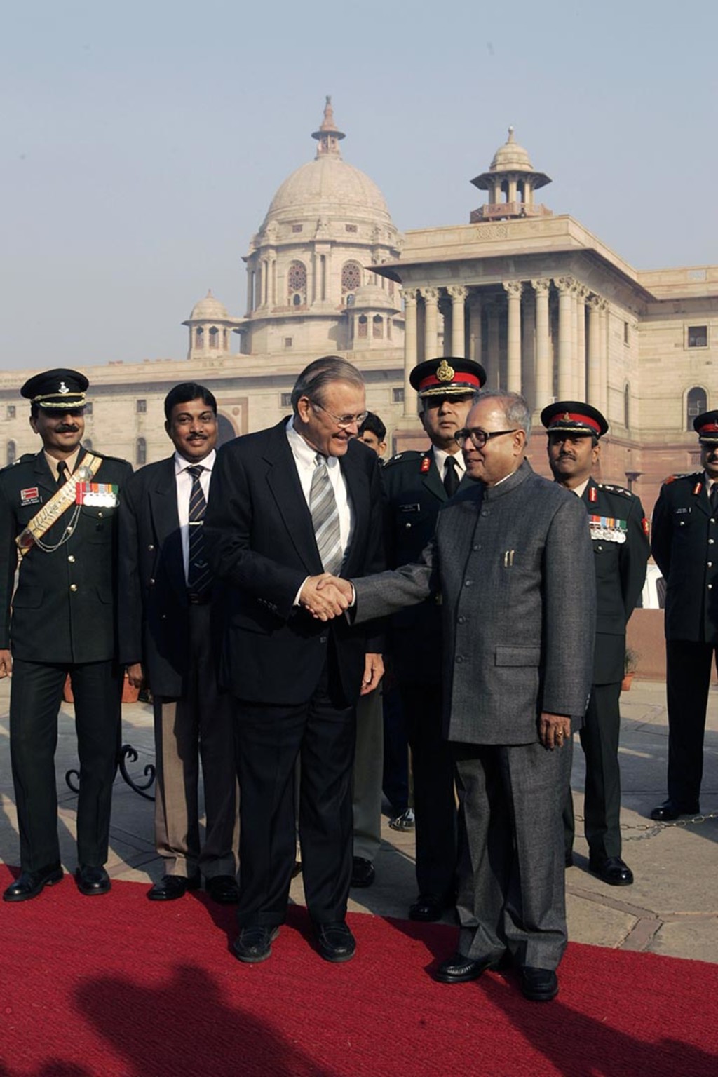 U.S. Defense Secretary Donald Rumsfeld shakes hands with Indian Defense Minister Pranab Mukherjee. Larry Downing/Reuters