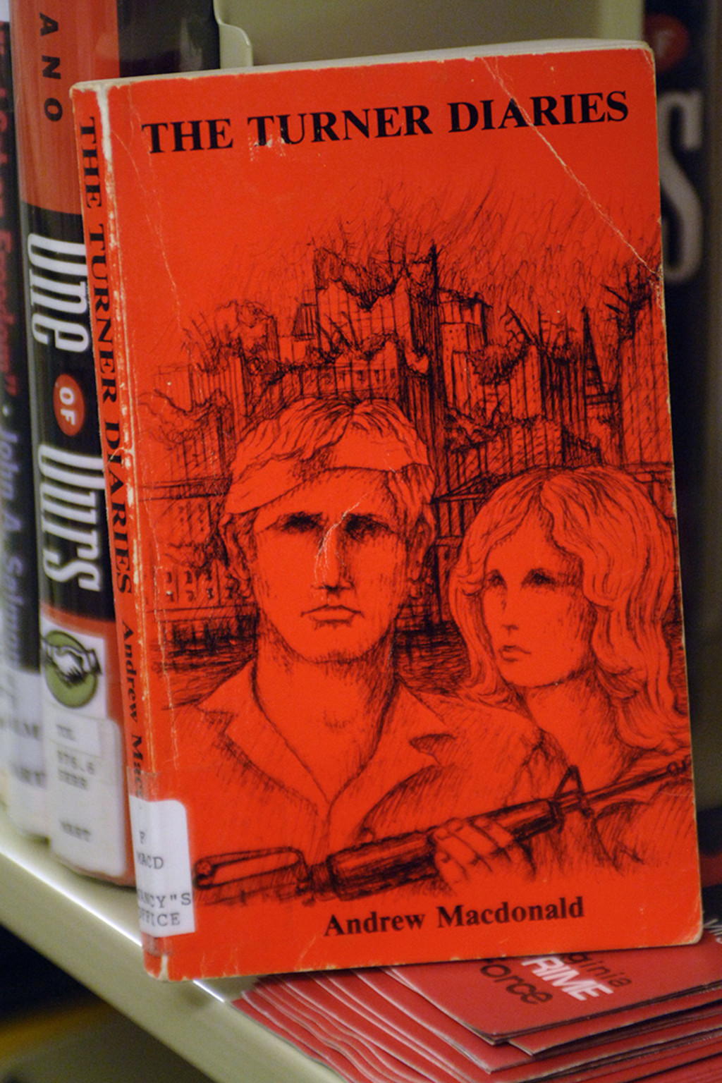 A copy of “The Turner Diaries,” a racist, dystopian novel, sits on a library shelf in Marlinton, West Virginia. 
