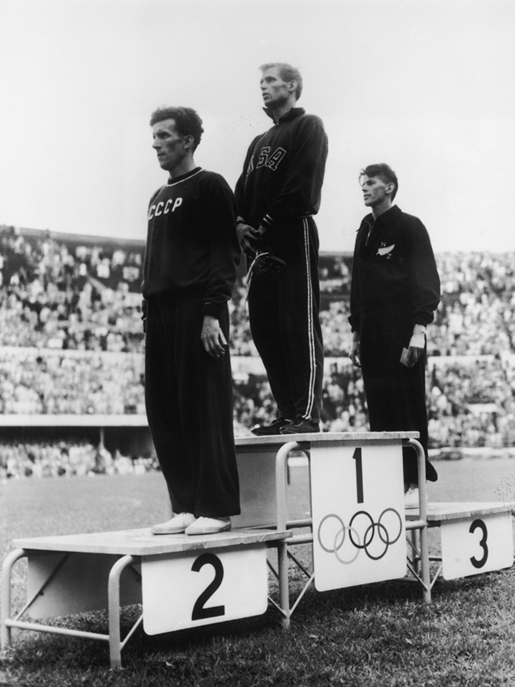 The Soviet Union’s Yuri Lituev (left) wins a silver medal in Helsinki, Finland. Keystone/Hulton Archive/Getty Images