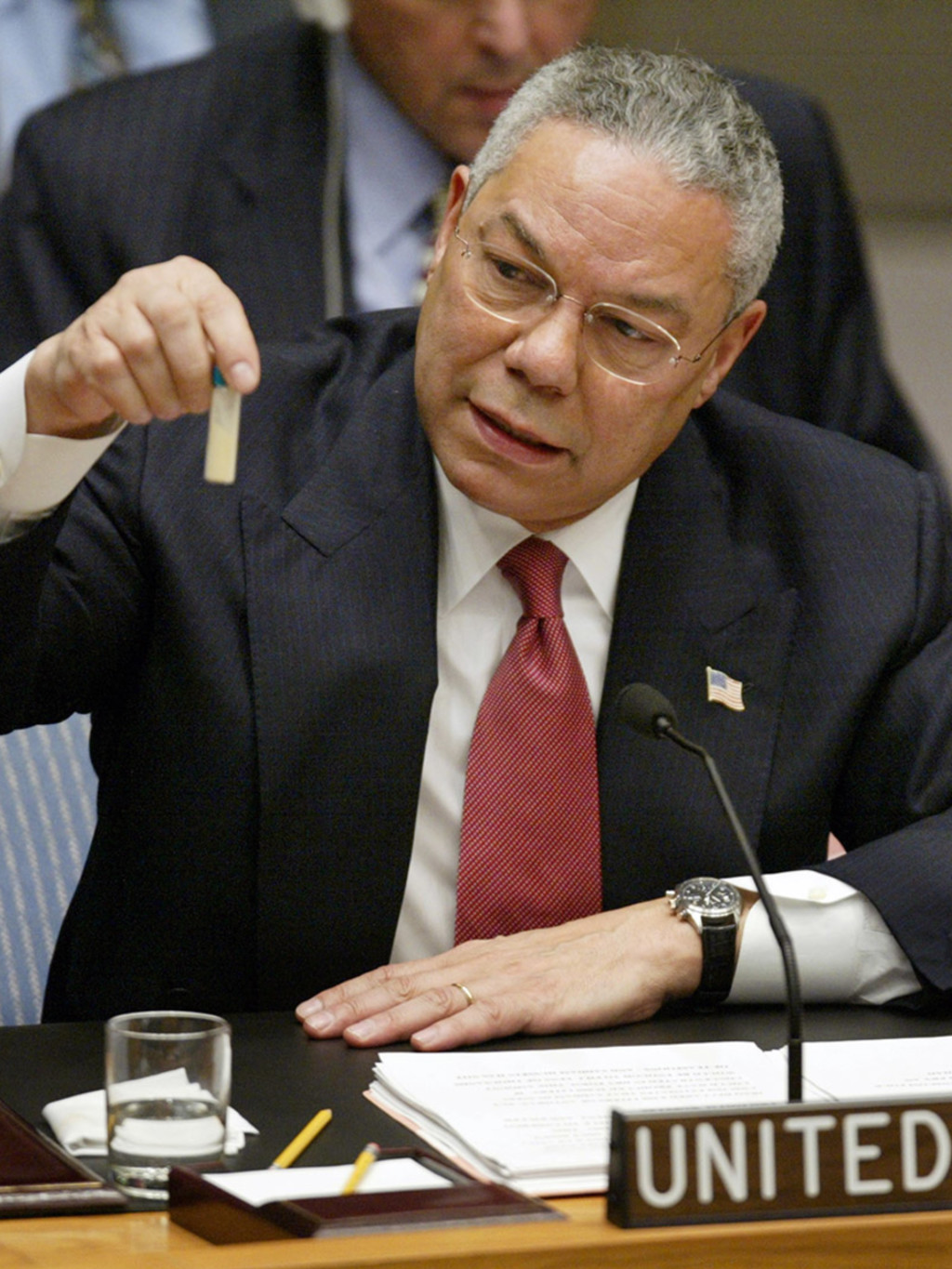 Secretary of State Colin Powell displays a vial like ones that he says Iraq uses to hold anthrax. Ray Stubblebine/Reuters