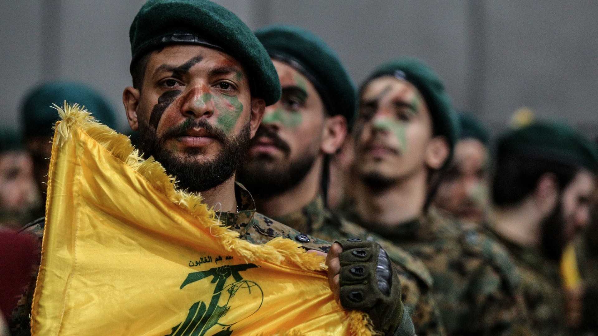 <p> Hezbollah militants parade through Beirut’s southern suburb.</p>
