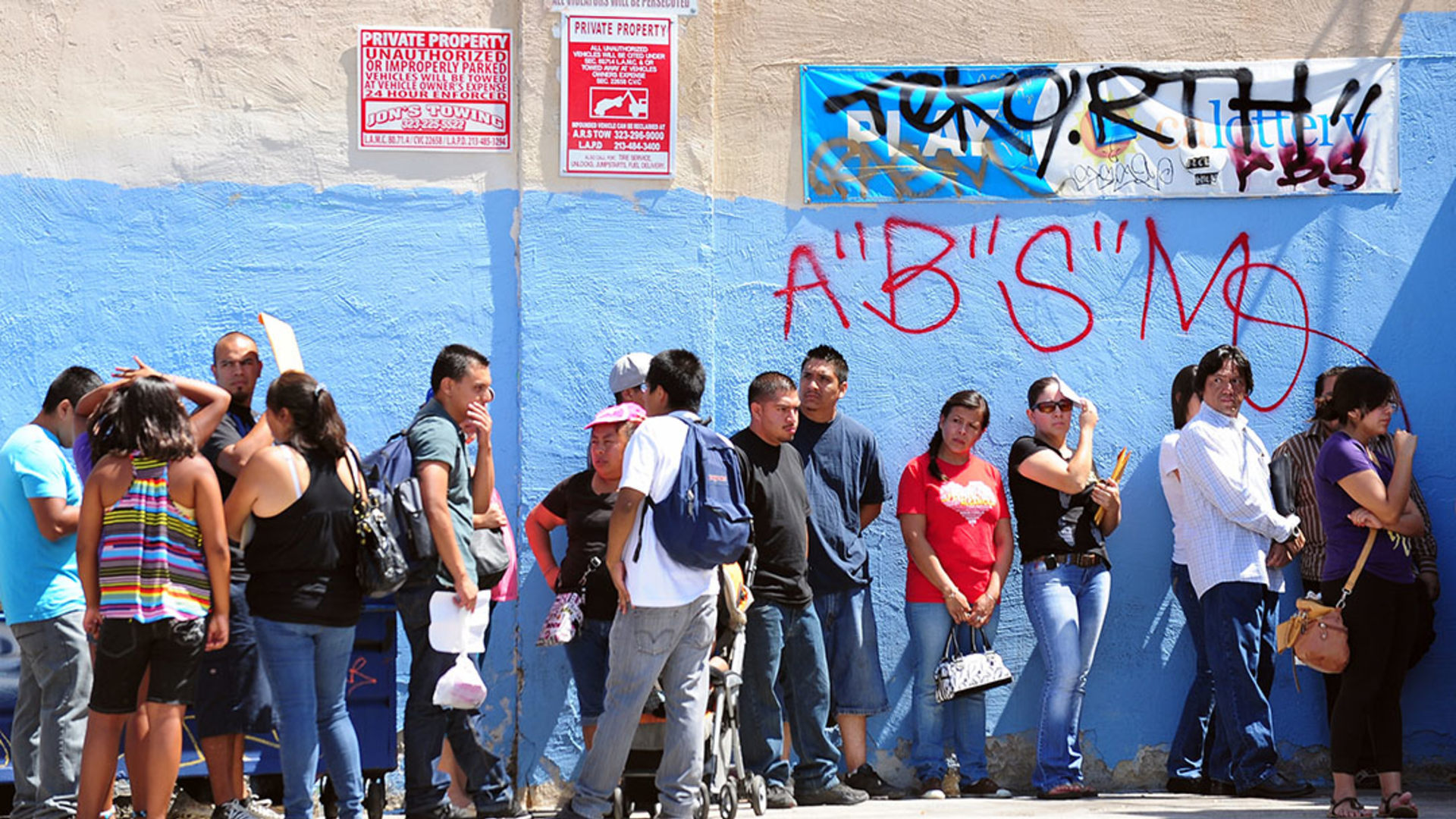 People wait in line to enter the Coalition for Humane Immigrant Rights of Los Angeles office on the first day of the DACA program. Frederic J. Brown/AFP/Getty Images