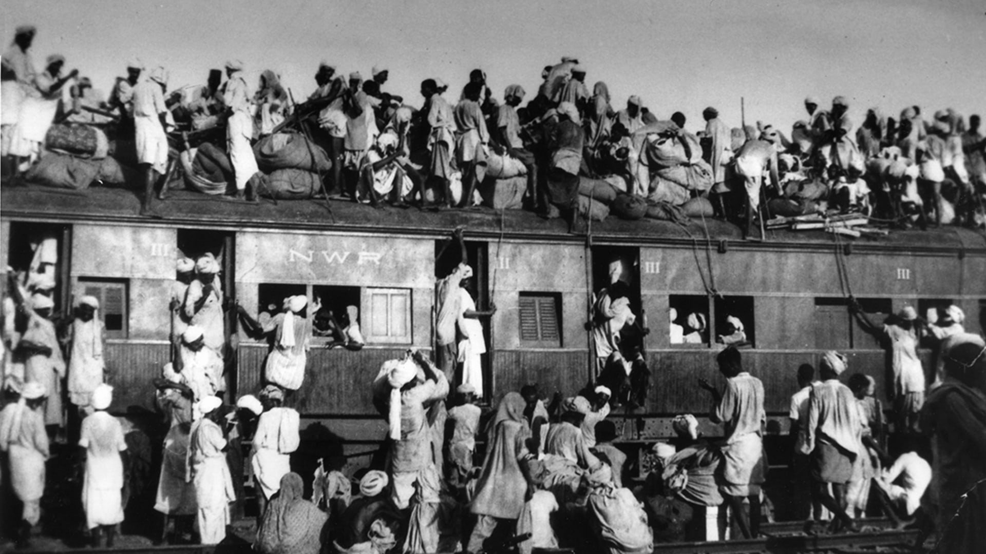 Muslim refugees attempt to flee India after partition in 1947. AP Photo