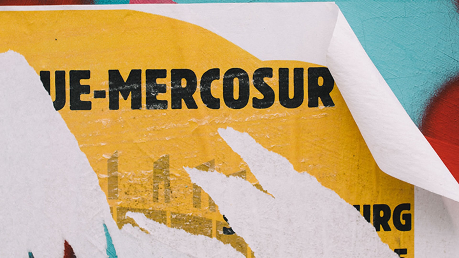 A poster about Mercosur is torn down in a street in Strasbourg, France.