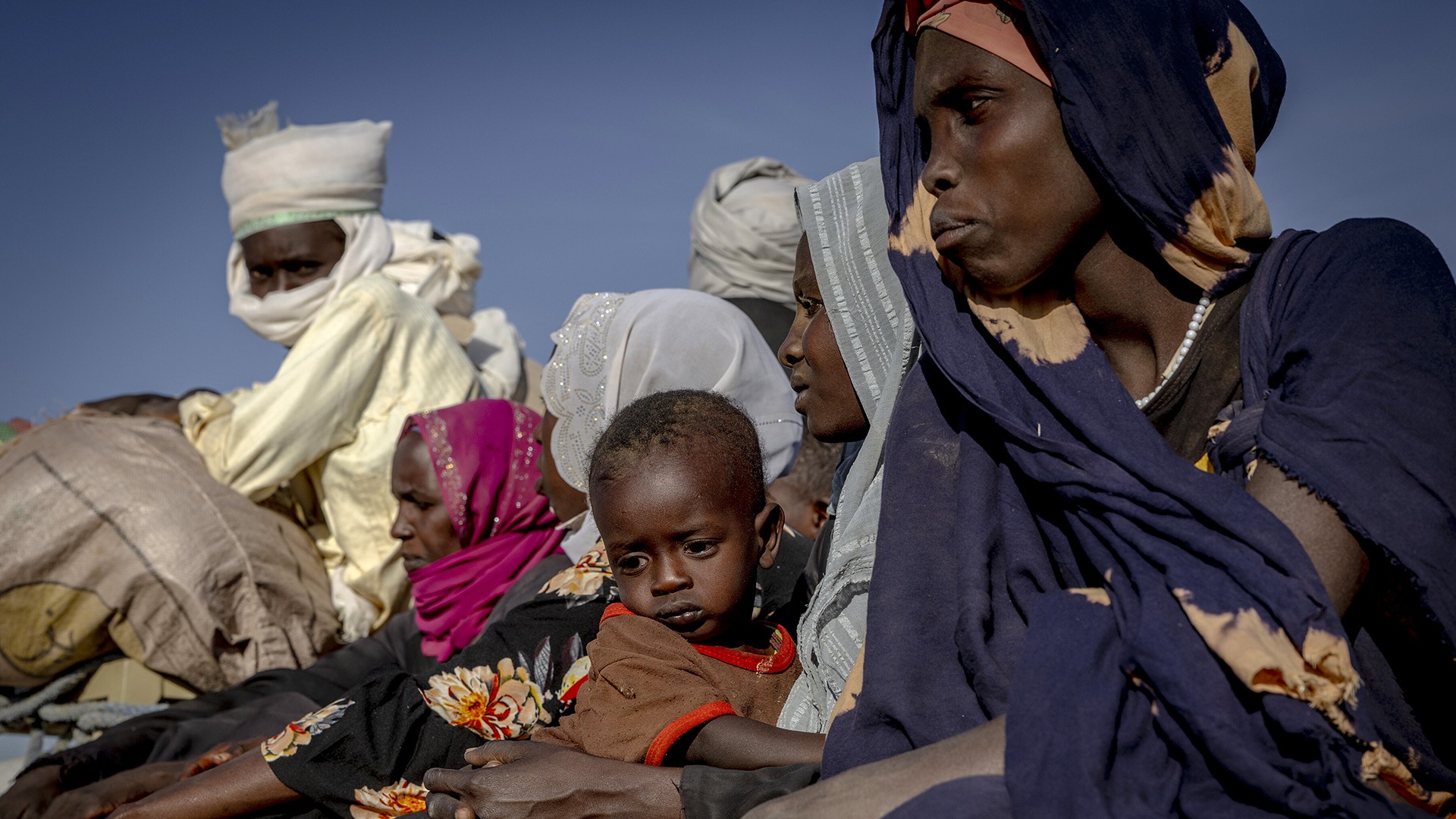 <p>Exhausted and covered in dust, a truck full of Sudanese refugees arrive on the outskirts of Oure Cassoni refugee camp in eastern Chad on November 30, 2025.</p>
