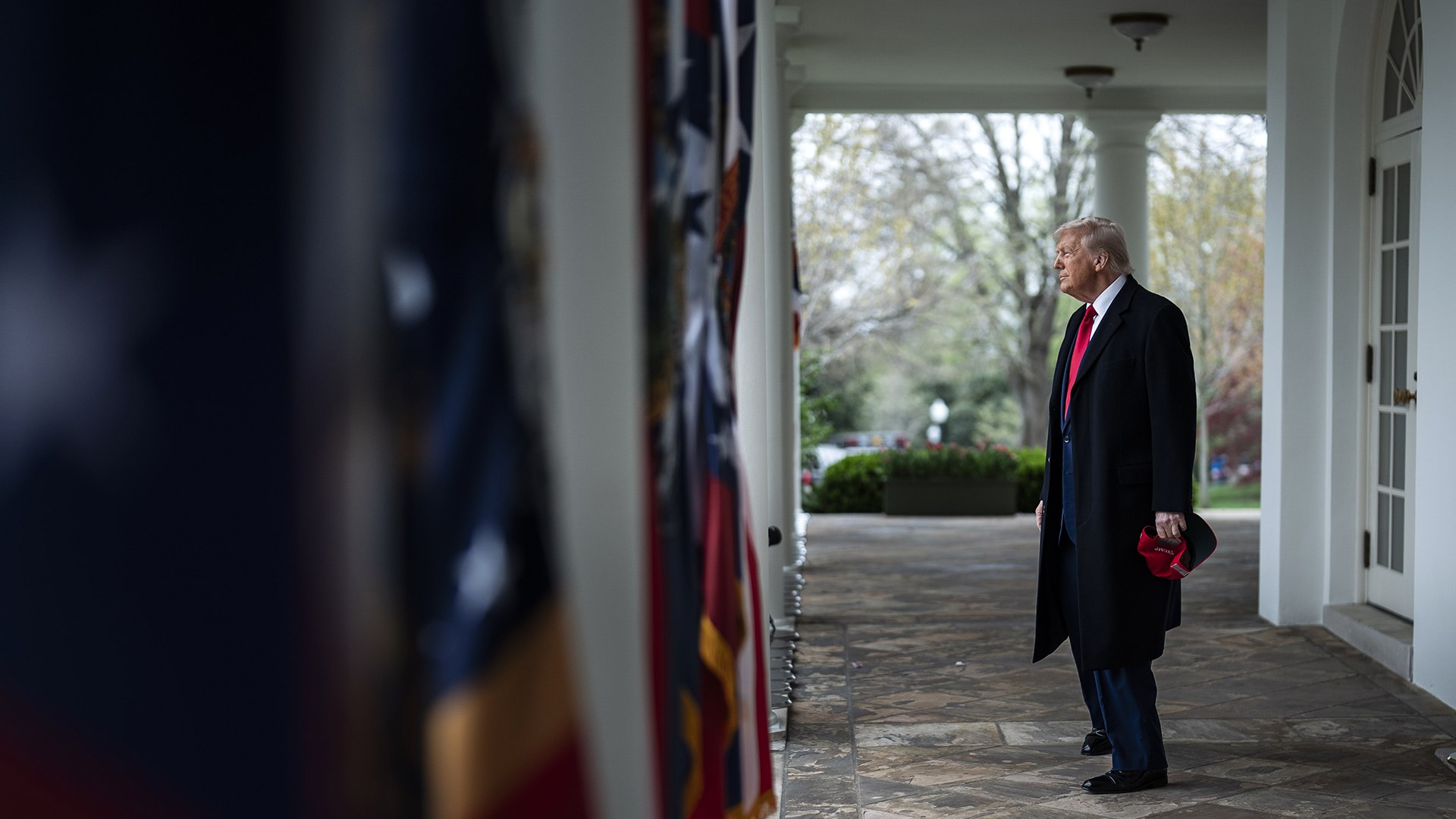 Image of President Trump about to walk onto the Rose Garden.