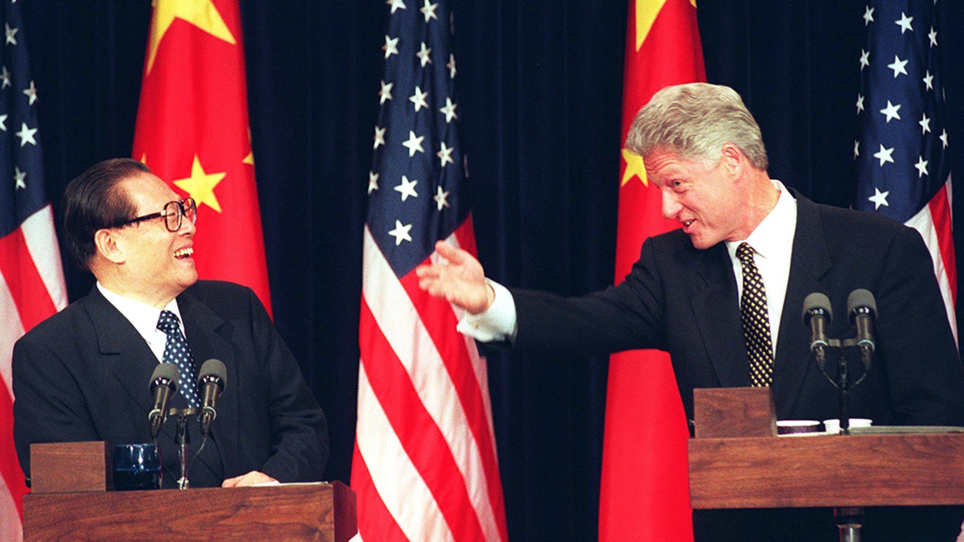 Former U.S. President Bill Clinton and former Chinese President Jiang Zemin at a press conference on October 29, 1997. AFP/Getty Images