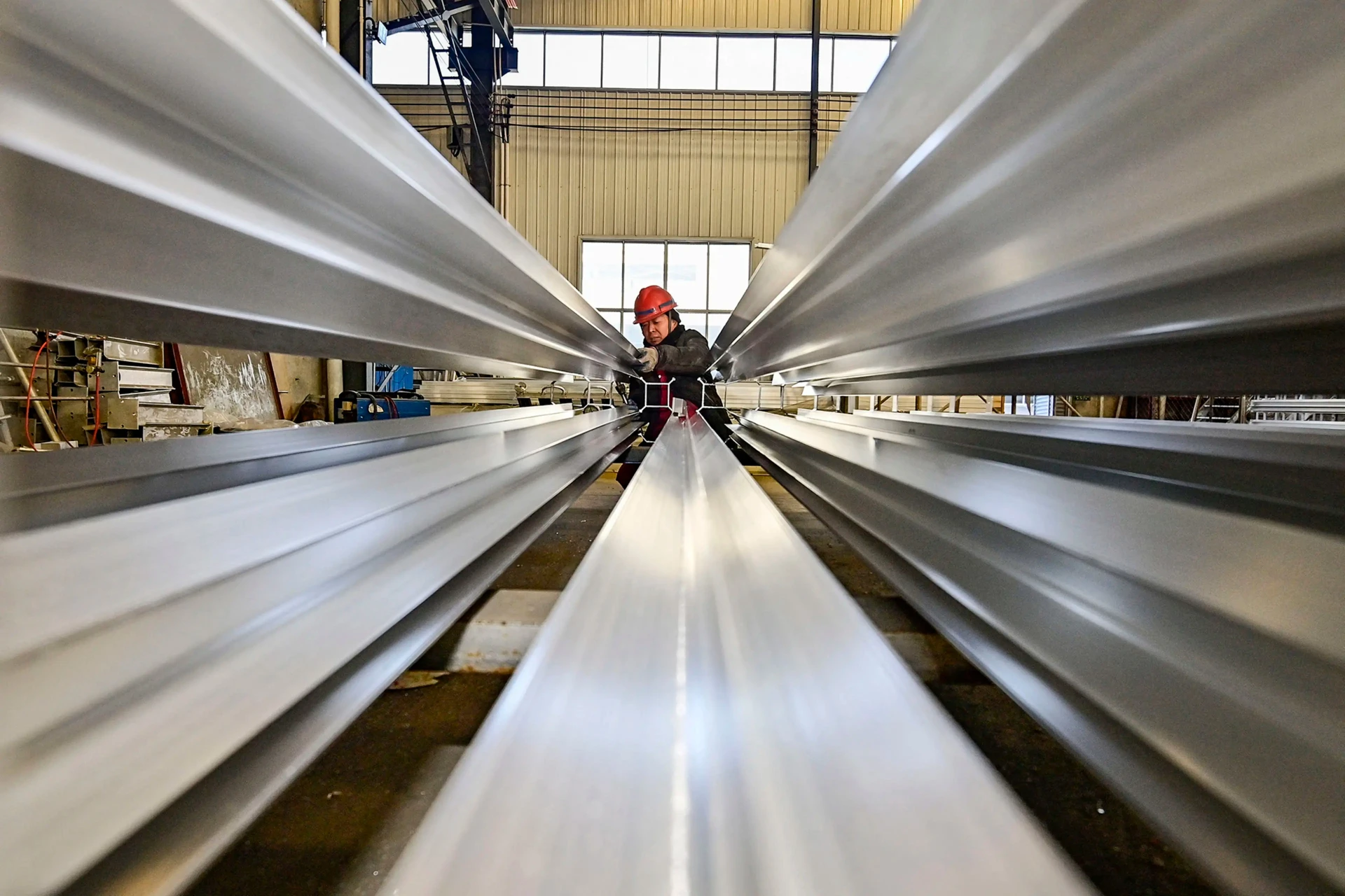 An employee works at a steel factory in China