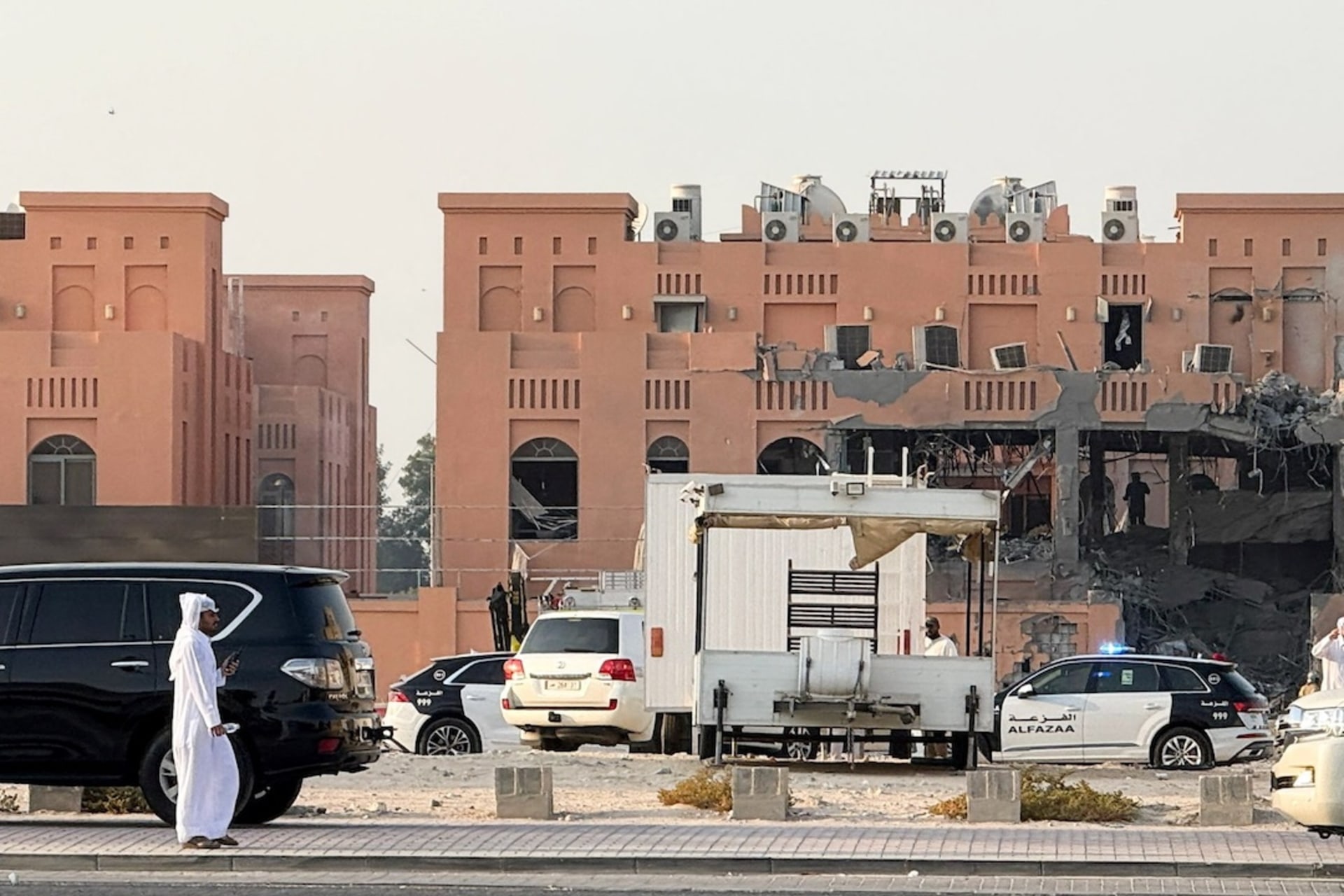 <p>A man walks near a damaged building, following an Israeli attack on Hamas leaders, according to an Israeli official, in Doha, Qatar, September 9, 2025.</p>
