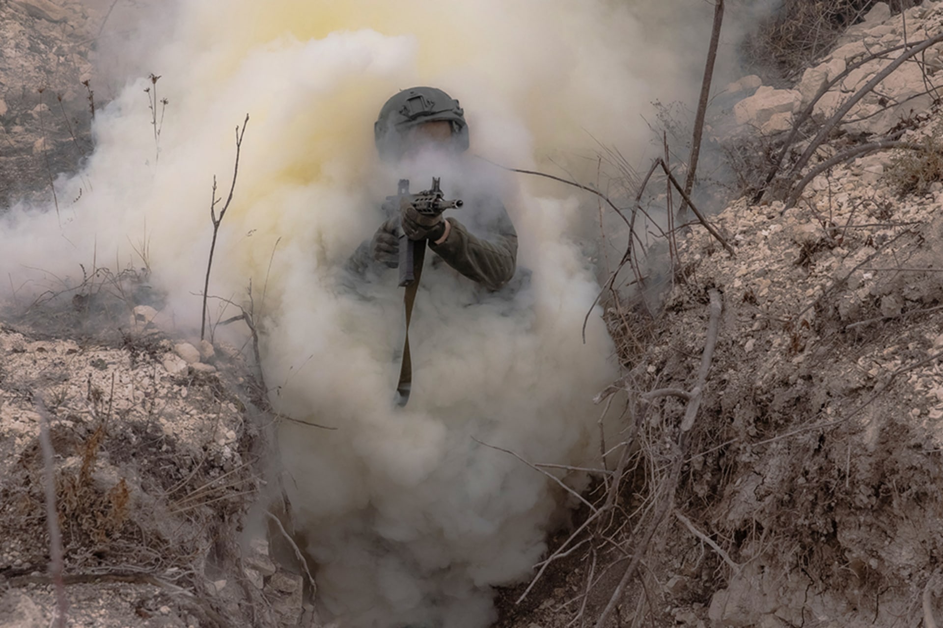 <p>A Ukrainian serviceman of the Azov Brigade moves through a trench during a military training exercise in the eastern Donetsk region, February 3, 2025.</p>