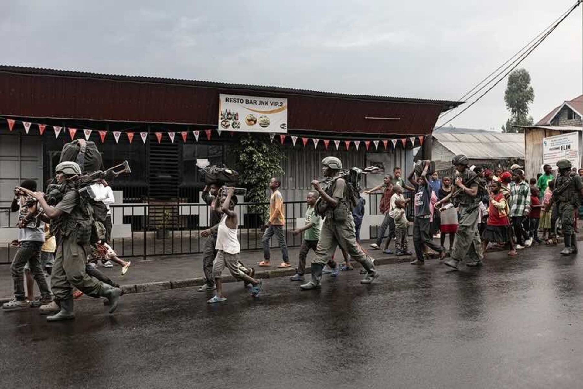 <p>Members of the M23 armed group walk through a street of the Keshero neighborhood in Goma, Democratic Republic of Congo on January 27, 2025. </p>