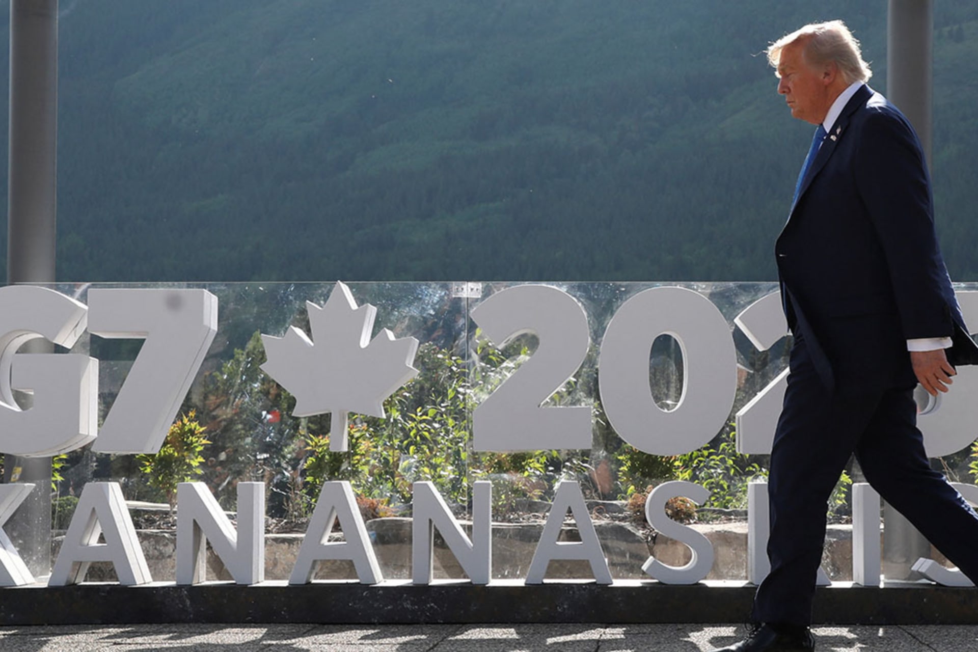 <p>U.S. President Donald Trump walks to have a family photo taken at the G7 Summit in Kananaskis, Alberta, Canada, June 16, 2025. </p>
