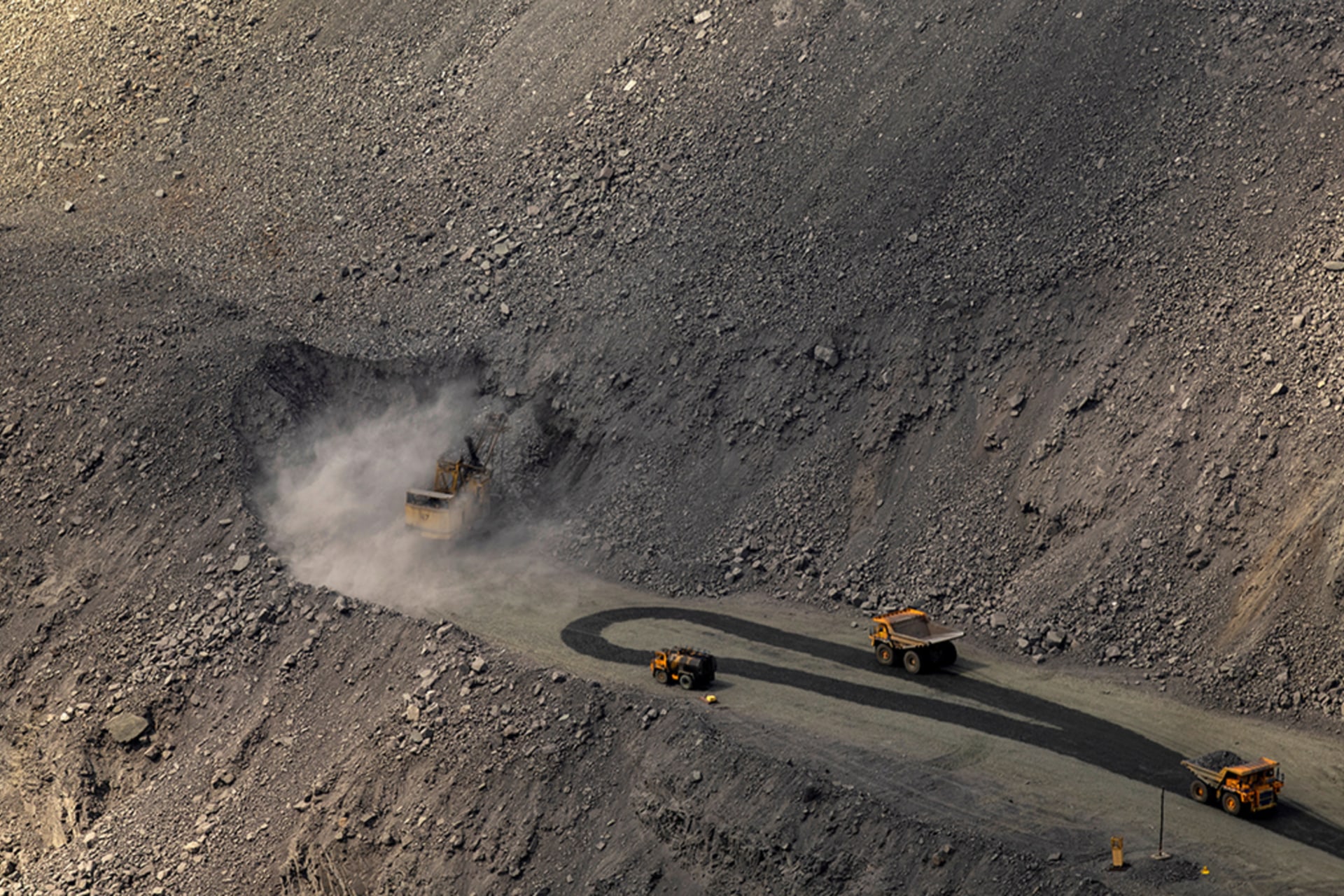 <p>An excavator digs as mining dump trucks drive in the Southern Iron Ore JV open-pit mine, amid Russia’s attack on Ukraine, in Kryvyi Rih, Ukraine April 23, 2025.</p>
