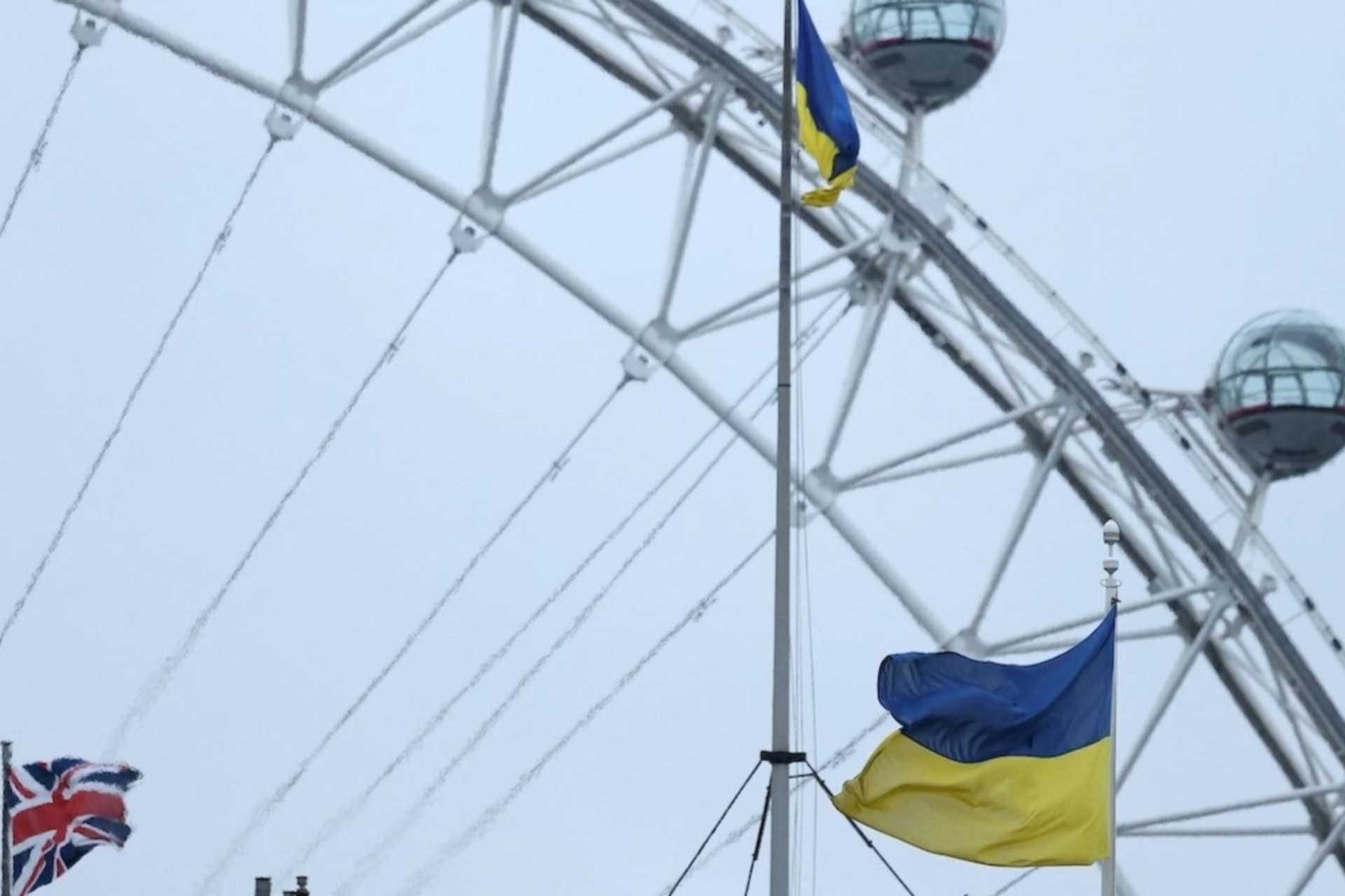 <p>The Ukrainian national flag continues to fly from British government buildings, with the London Eye wheel seen behind, as peace discussions on Ukraine and Russia are due to take place in London, Britain, April 23, 2025.</p>
