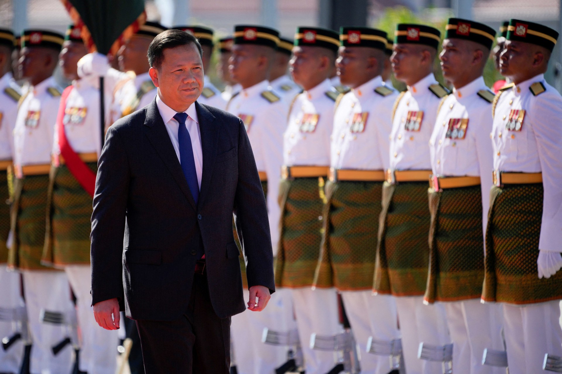 <p>Cambodian Prime Minister Hun Manet inspects an honour guard during a welcoming ceremony at the Prime Minister’s office in Putrajaya, Malaysia, on February 27, 2024.</p>