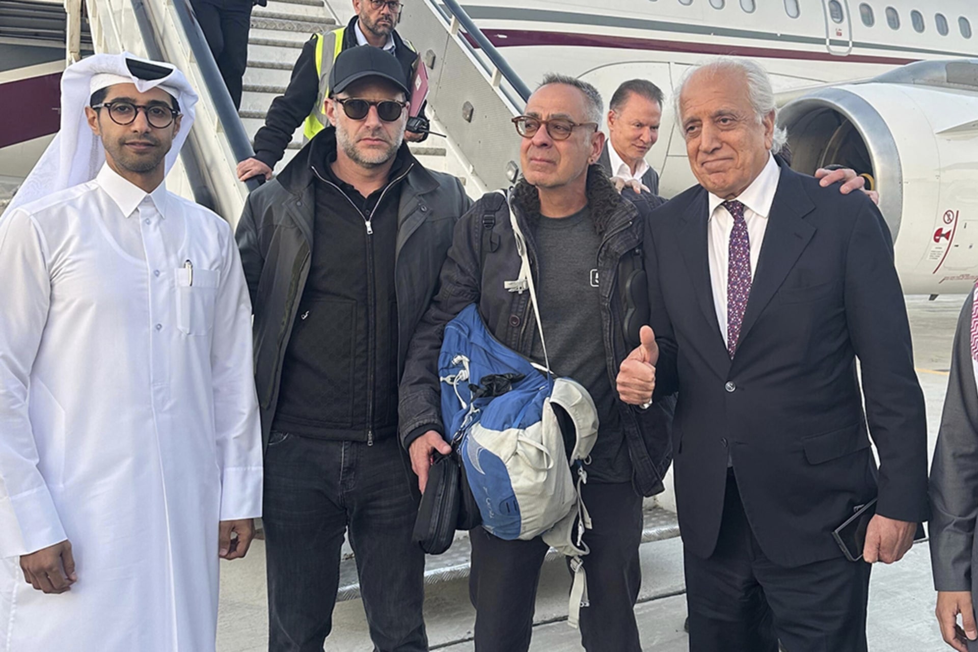 <p>George Glezmann, center, poses with Adam Boehler, second left, and Zalmay Khalilzad, second right, and Qatari diplomats in Kabul, Afghanistan, Thursday, March 20, 2025, before departing to Doha, Qatar.</p>
