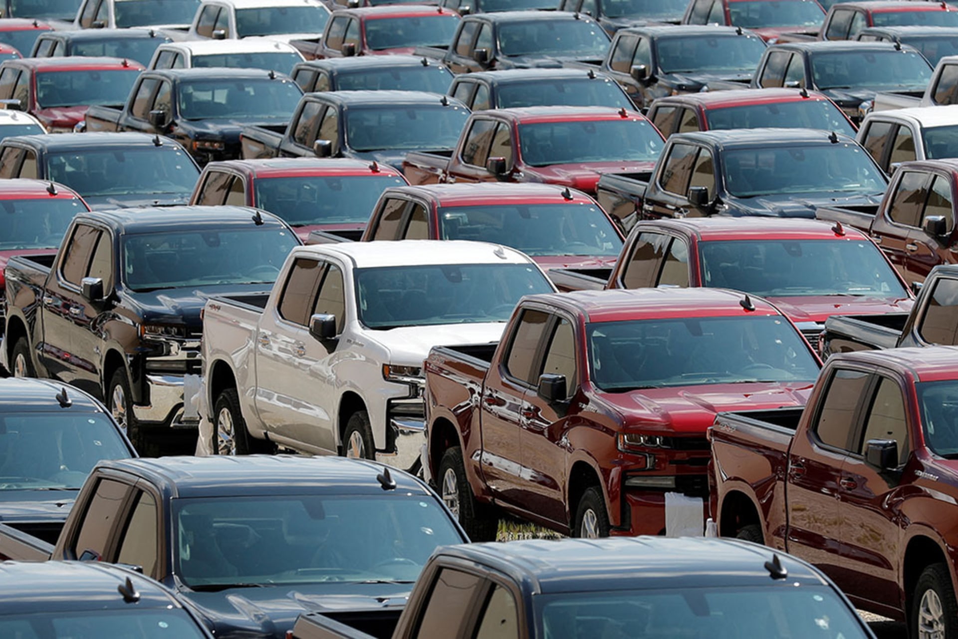 <p>Assembled trucks are ready for delivery at GM’s Chevrolet Silverado and GMC Sierra pickup truck plant in Fort Wayne, Indiana, U.S., July 25, 2018. </p>
