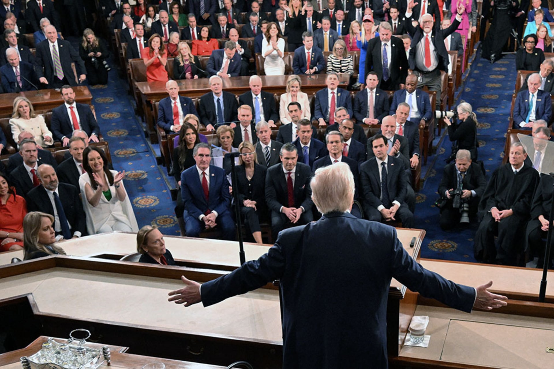 <p>U.S. President Donald Trump gestures as he speaks during an address to a joint session of Congress at the U.S. Capitol in Washington, DC, on March 4, 2025. </p>