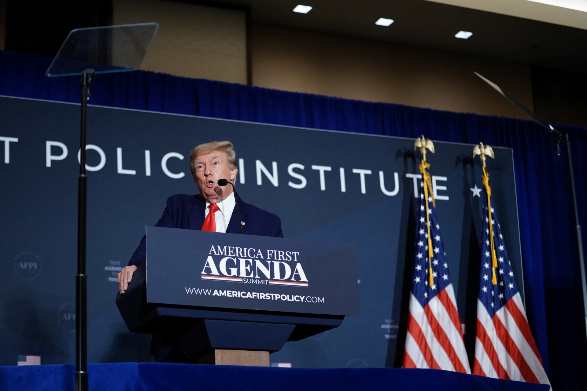 <p>U.S. President Donald Trump delivers remarks at the America First Policy Institute America First Agenda Summit in Washington, U.S., July 26, 2022.</p>
