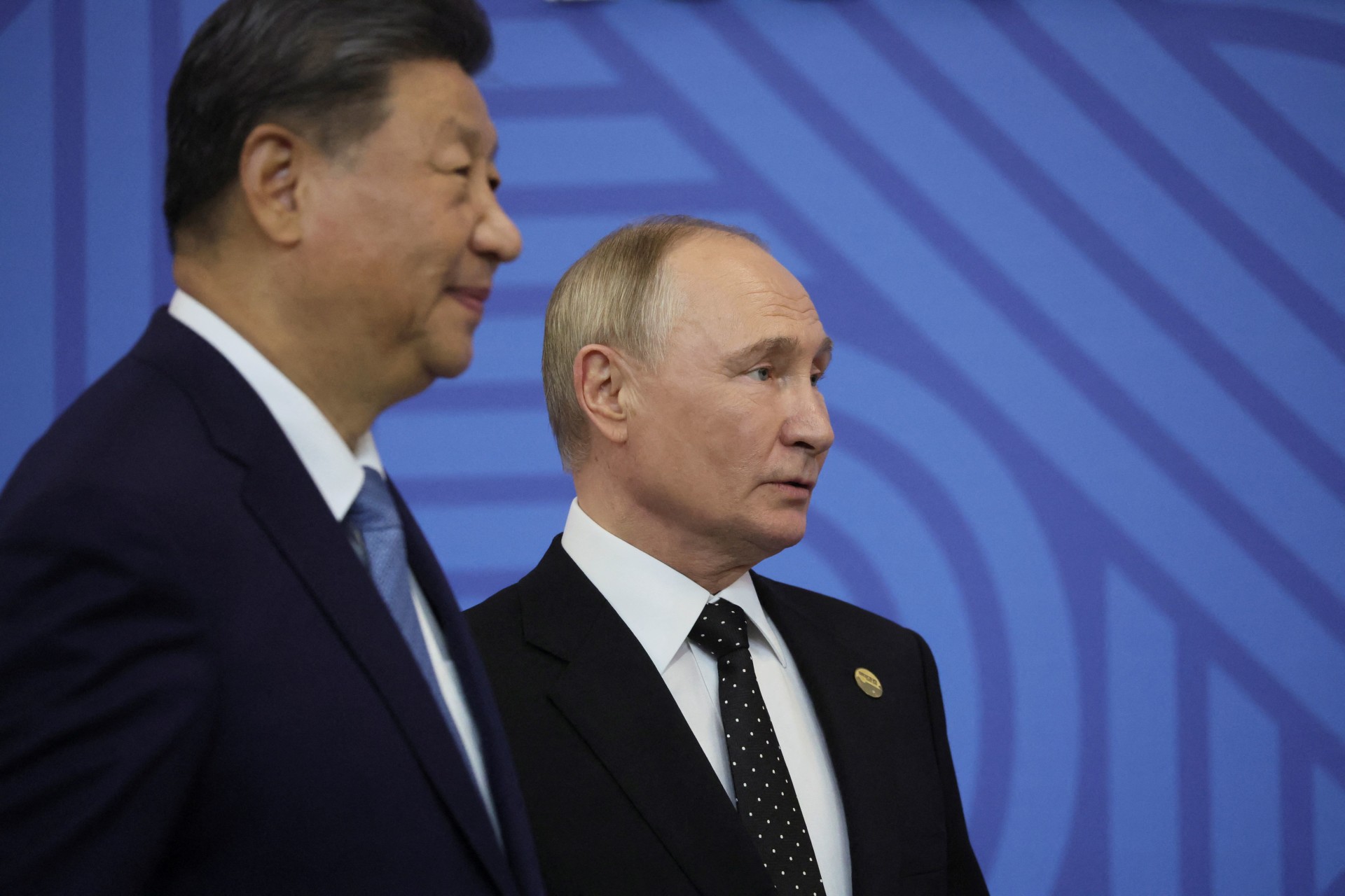 <p>Russia’s President Vladimir Putin and Chinese President Xi Jinping take part in an official welcoming ceremony for delegations’ heads at the BRICS summit in Kazan, Russia, 23 October 2024.</p>
