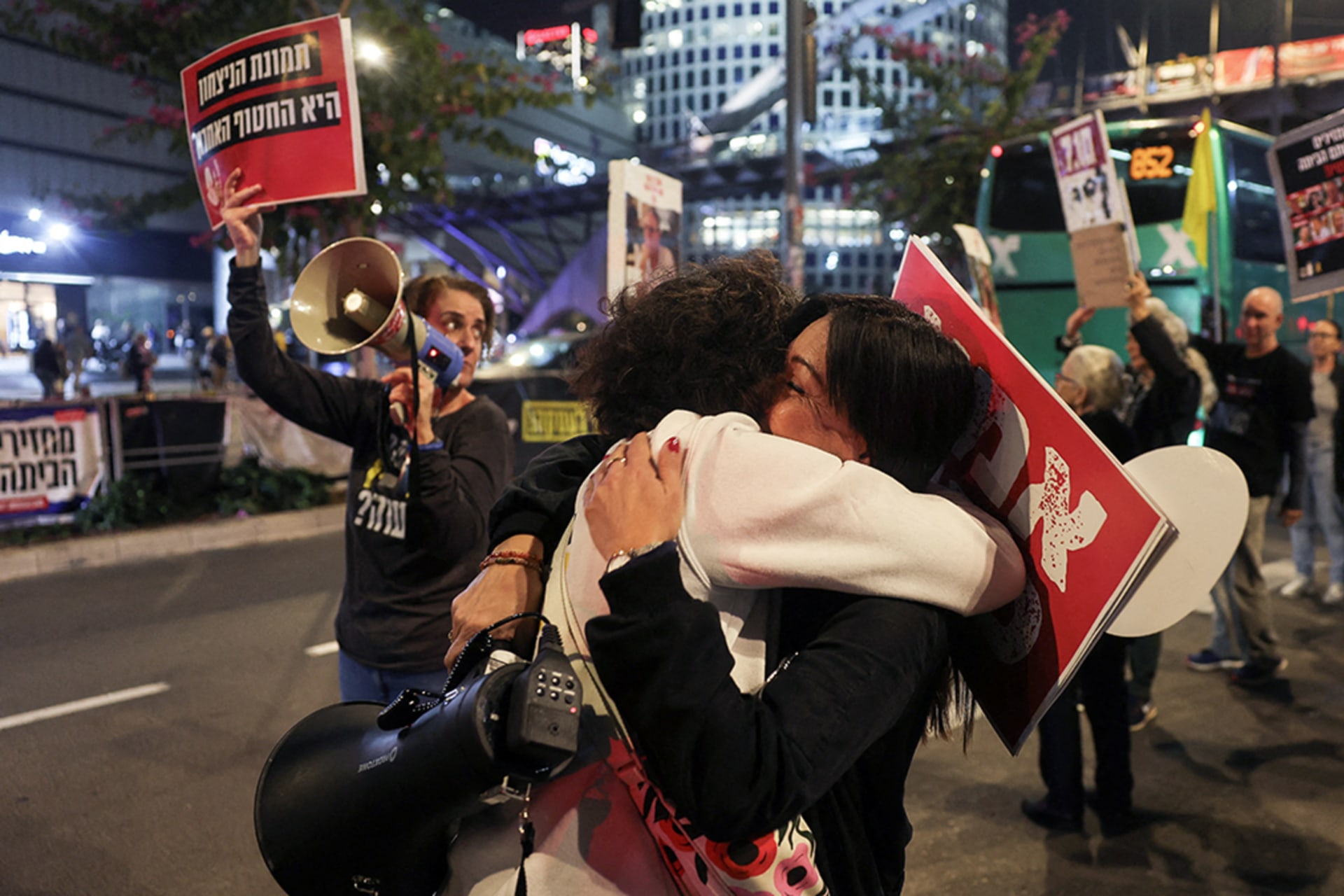 <p>Supporters of Israeli hostages, who were kidnapped during the deadly October 2023 attack by Hamas, react to news on the Gaza cease-fire negotiations, January 15, 2025.</p>
