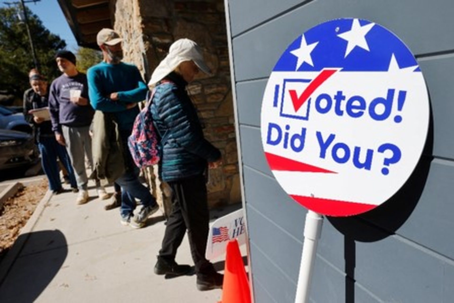 <p>Voters line up on the first day of early in-person voting in Asheville, North Carolina, on October 17, 2024.</p>