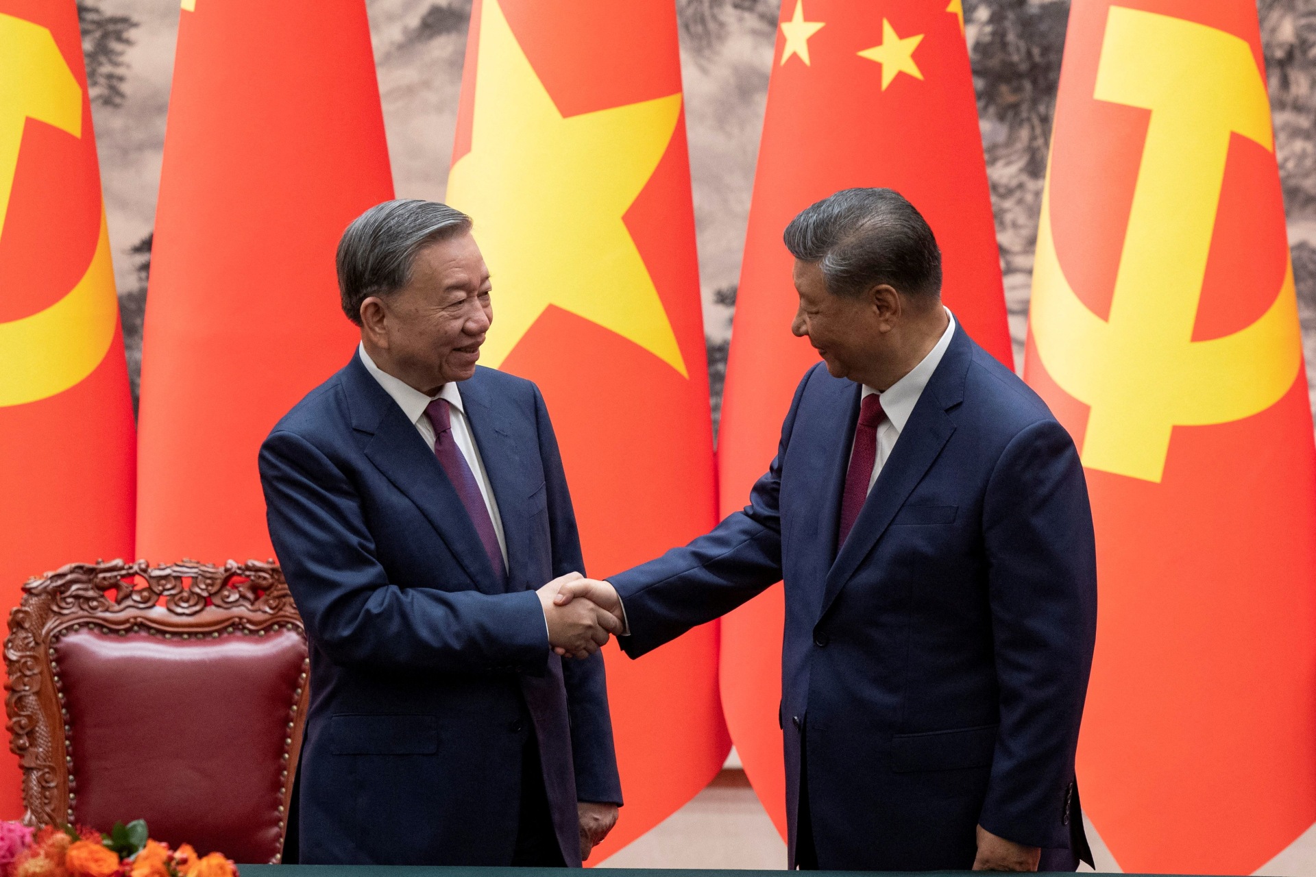 <p>Chinese President Xi Jinping and Vietnam’s President To Lam shake hands after a signing ceremony at the Great Hall of the People in Beijing, China, on August 19, 2024.</p>