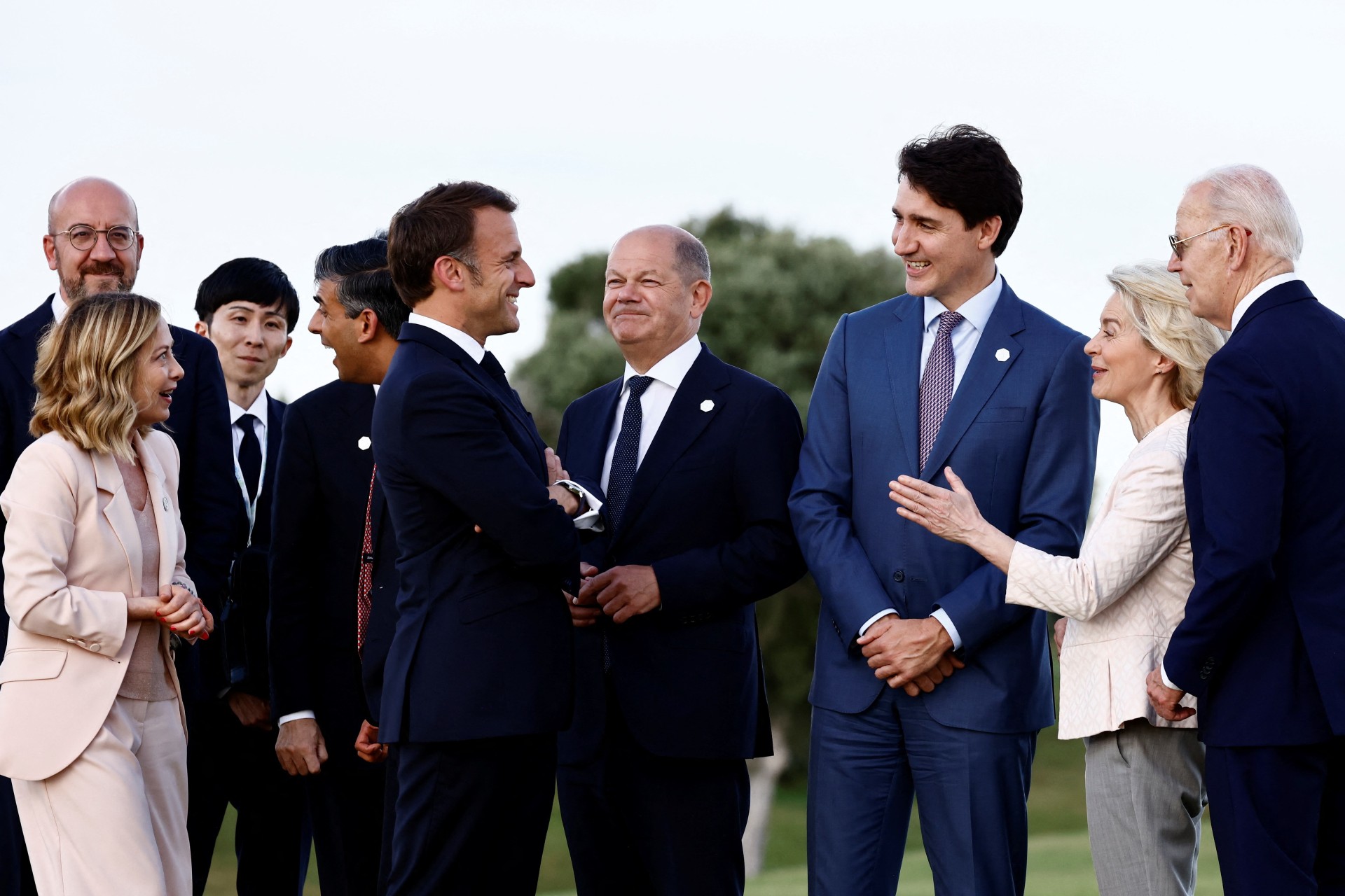 <p>Giorgia Meloni, Charles Michel, Rishi Sunak, Olaf Scholz,Justin Trudeau, Ursula von der Leyen, Emmanuel Macron and Joe Biden stand together on the first day of the G7 summit, in Savelletri, Italy, June 13, 2024.</p>