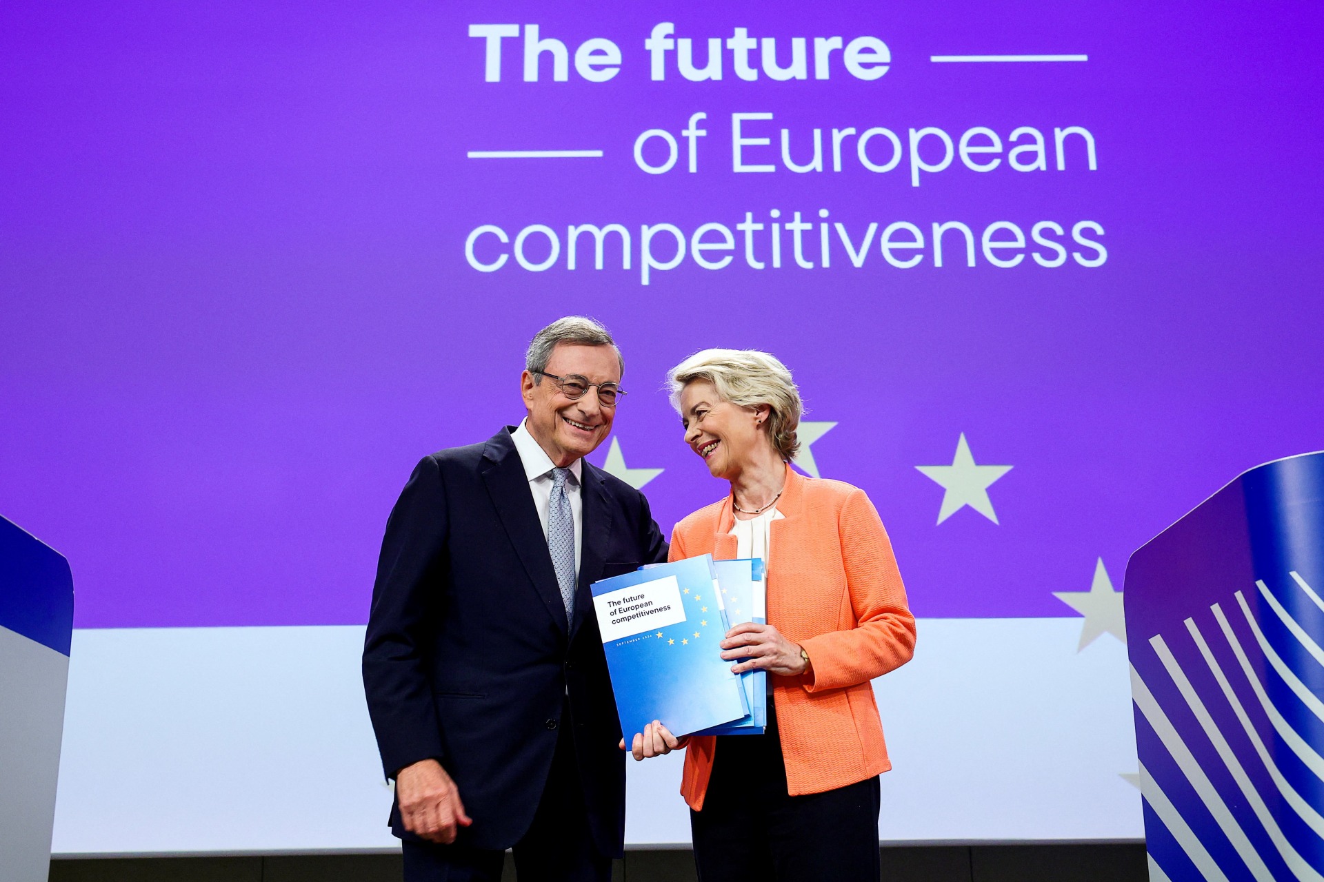 <p>European Commission President Ursula von der Leyen holds Former European Central Bank (ECB) chief Mario Draghi’s report on EU competitiveness and recommendations, as they attend a press conference, in Brussels, Belgium on September 9, 2024</p>