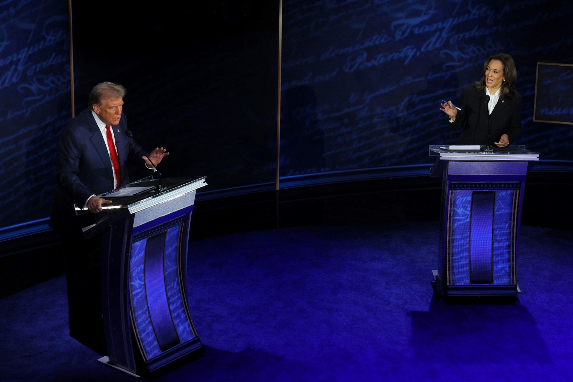 <p>Republican presidential nominee, former U.S. President Donald Trump, and Democratic presidential nominee, U.S. Vice President Kamala Harris, both speak as they attend a presidential debate in Philadelphia, Pennsylvania, on September 10, 2024.</p>
