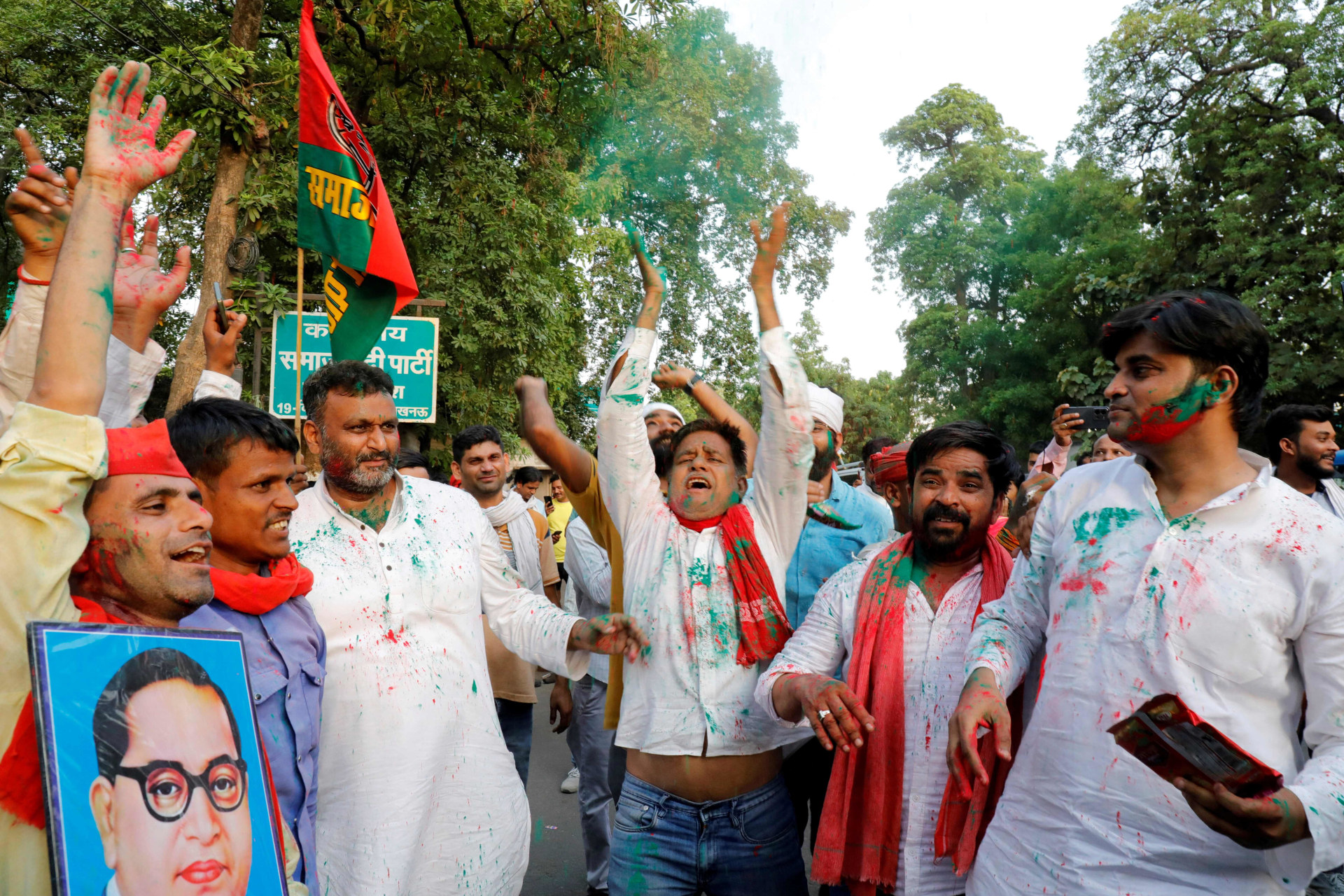 <p>Supporters of Samajwadi Party, a regional political party, shout slogans as they celebrate on the day of the general election results, in Lucknow, India on June 4, 2024.</p>
