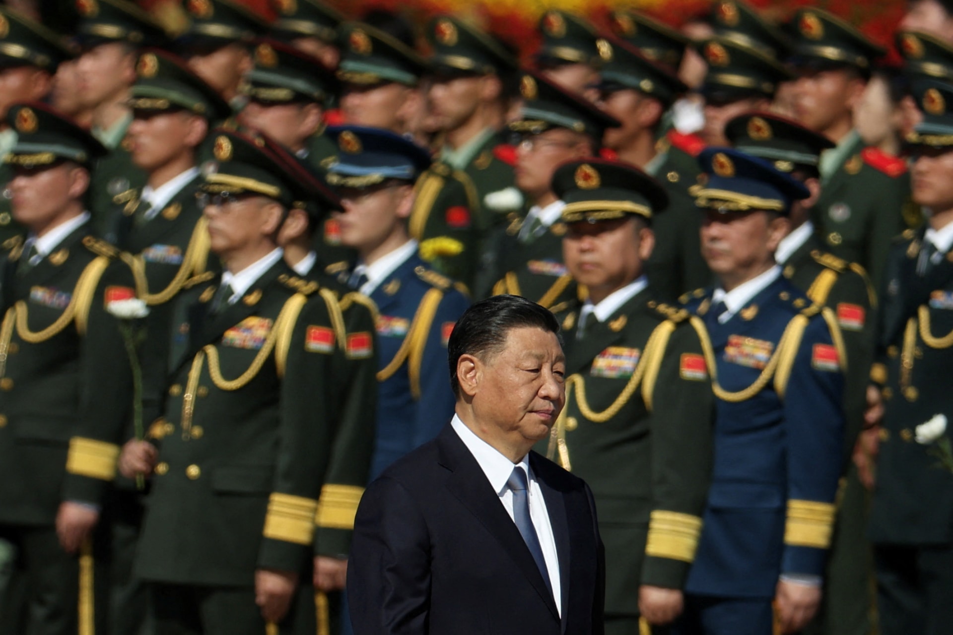 <p>Chinese President Xi Jinping walks past members of the Chinese People’s Liberation Army day ahead of China’s National Day, on Tiananmen Square</p>