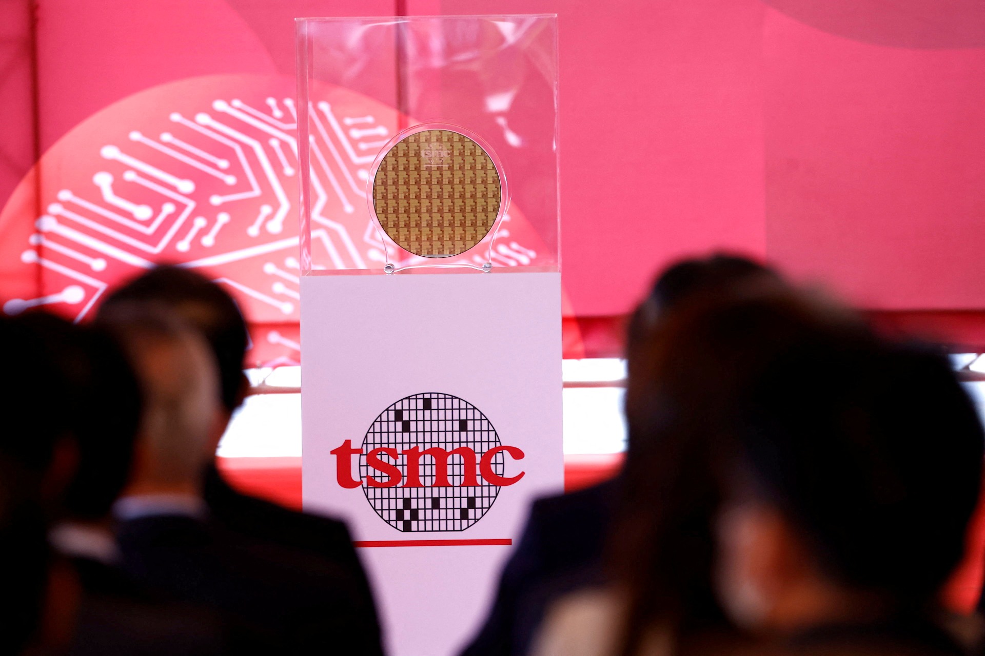 <p>A wafer can be seen as taiwanese chip giant TSMC holds a ceremony to start mass production of its most advanced 3-nanometer chips in the southern city of Tainan, Taiwan.</p>