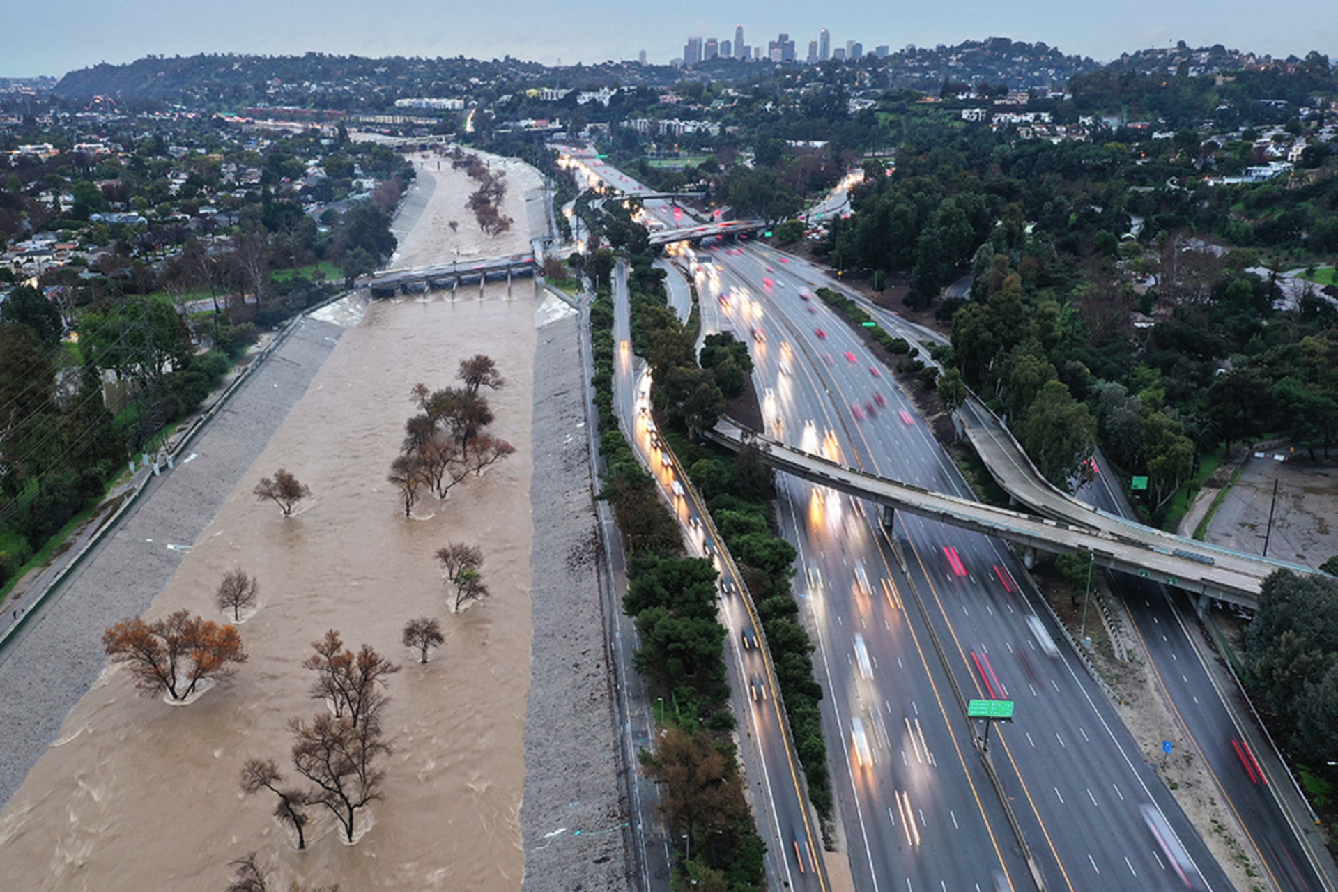 <p>The Los Angeles River swells after an atmospheric river dropped seven inches of rain in February 2024.</p>
