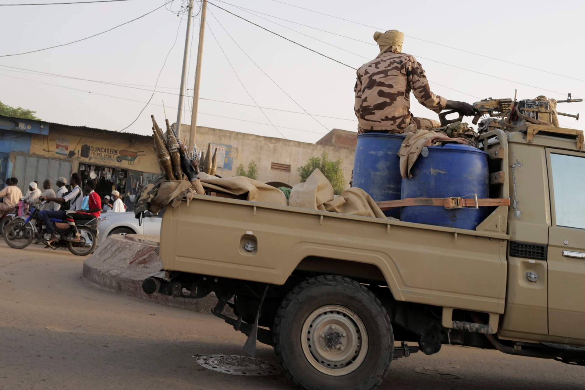 <p>Members of the security forces drive along the market following the battlefield death of President Idriss Deby in N’Djamena, Chad April 26, 2021.</p>