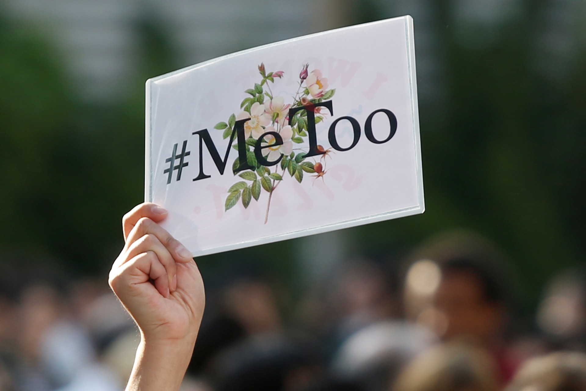 <p>A protester raises a placard reading “#MeToo” during a rally against harassment at Shinjuku shopping and amusement district in Tokyo, Japan, April 28, 2018.</p>