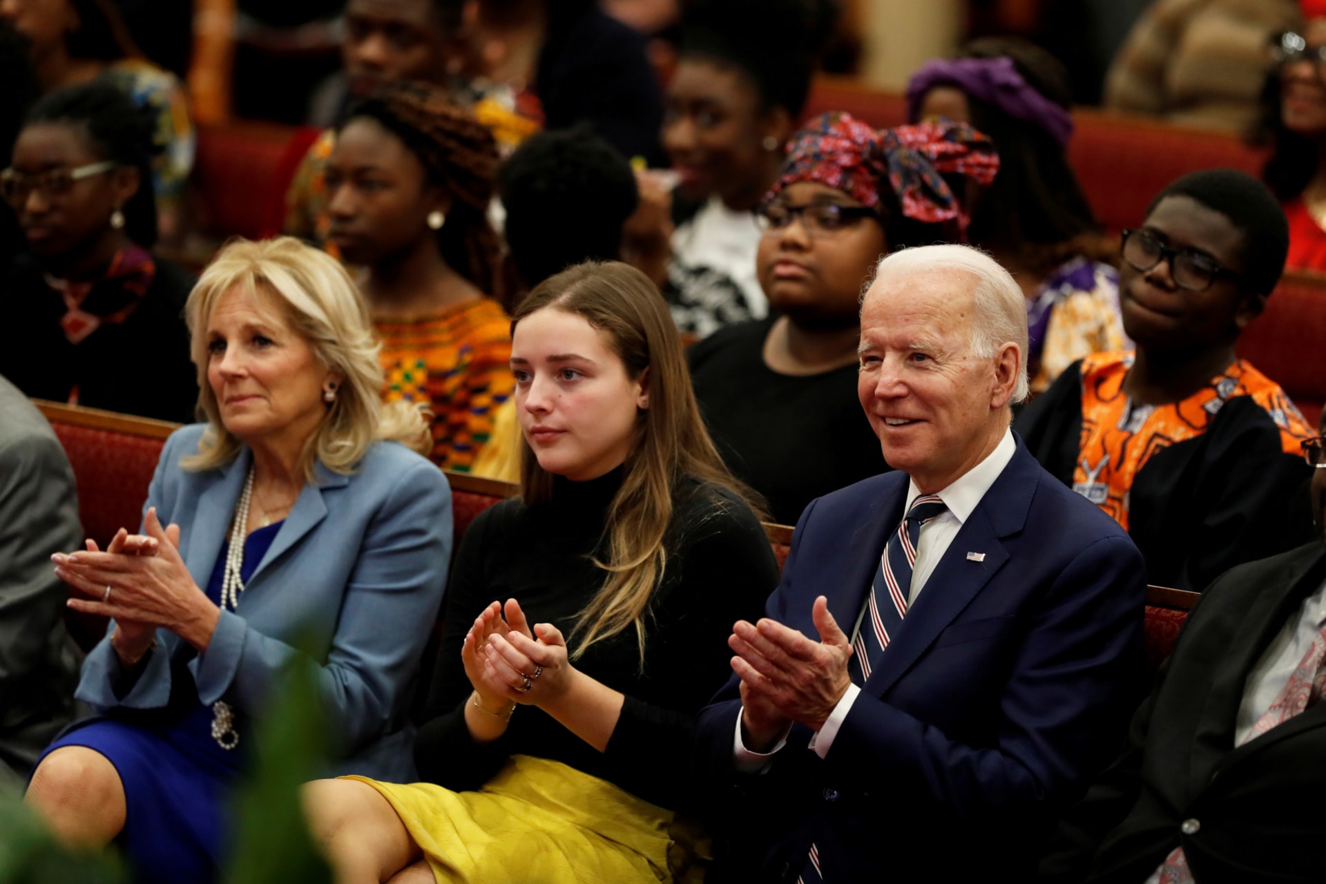 <p>Democratic presidential candidate and former U.S. Vice President Joe Biden, his granddaughter Finnegan Biden and wife Jill Biden, take part in Sunday services at Royal Missionary Baptist Church in North Charleston, South Carolina on February 23, 2020.</p>