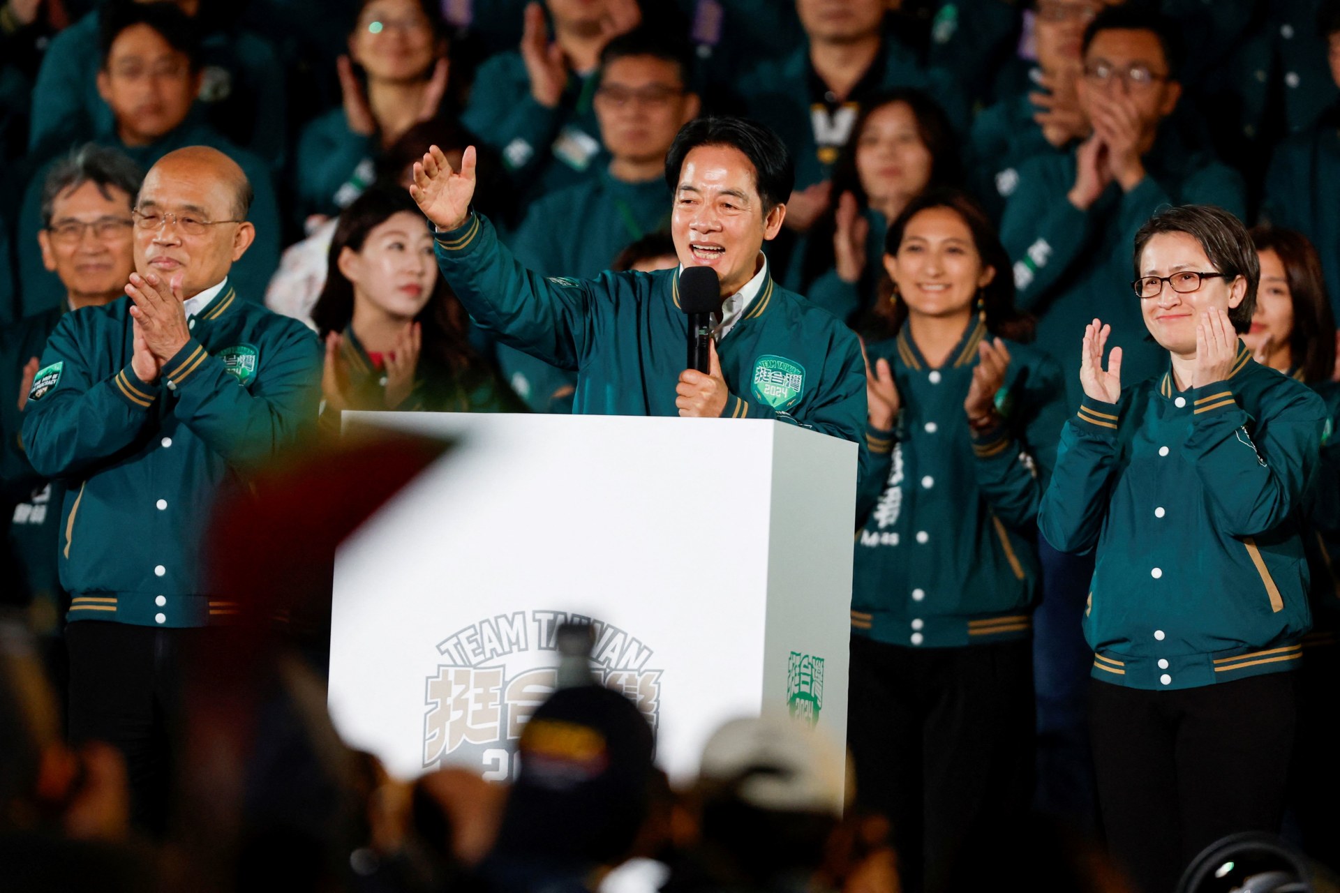 <p>Taiwan President-elect Lai Ching-te speaks on stage at a rally, flanked by his running mate Hsiao Bi-khim, following the victory in the presidential elections, in Taipei, Taiwan, on January 13, 2024.</p>
