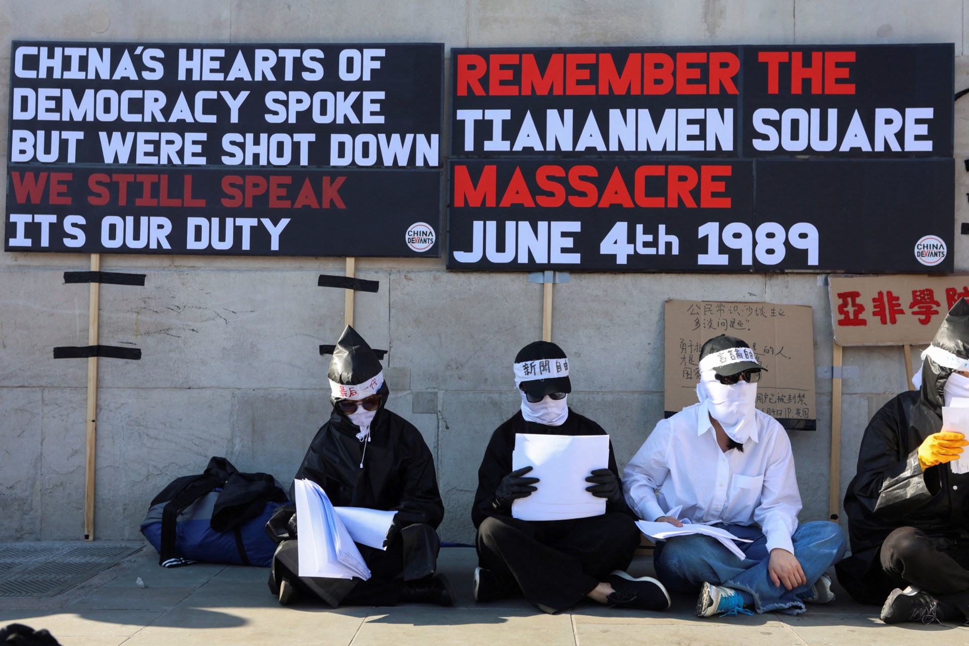 <p>People attend a demonstration marking the 34th anniversary of China’s 1989 crackdown on pro-democracy protesters around Beijing’s Tiananmen Square and in solidarity with blank paper protestors, in Trafalgar Square in London, Britain, on June 4, 2023.</p>
