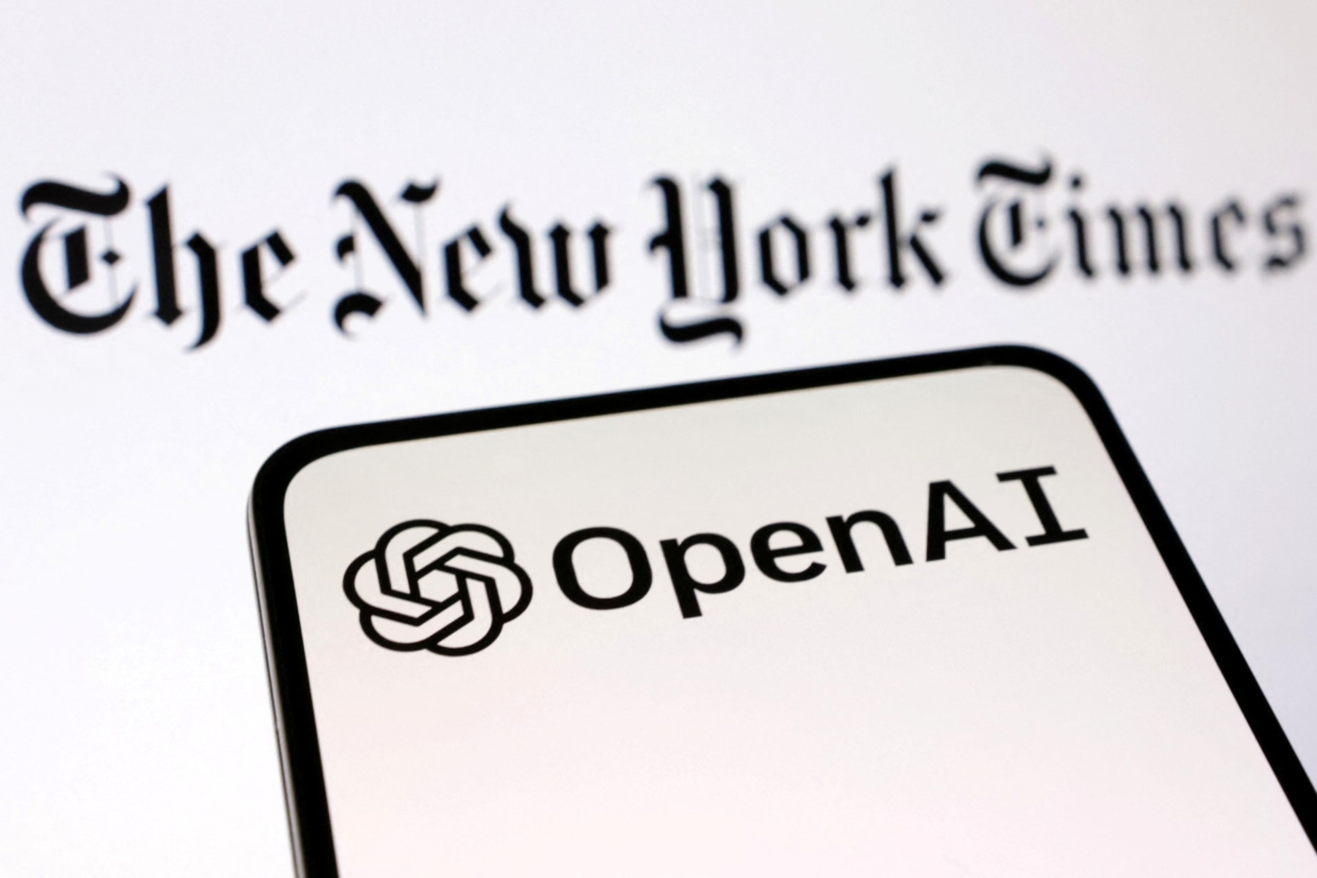 <p>OpenAI and The New York Times logos are seen in this illustration taken on December 27, 2023</p>