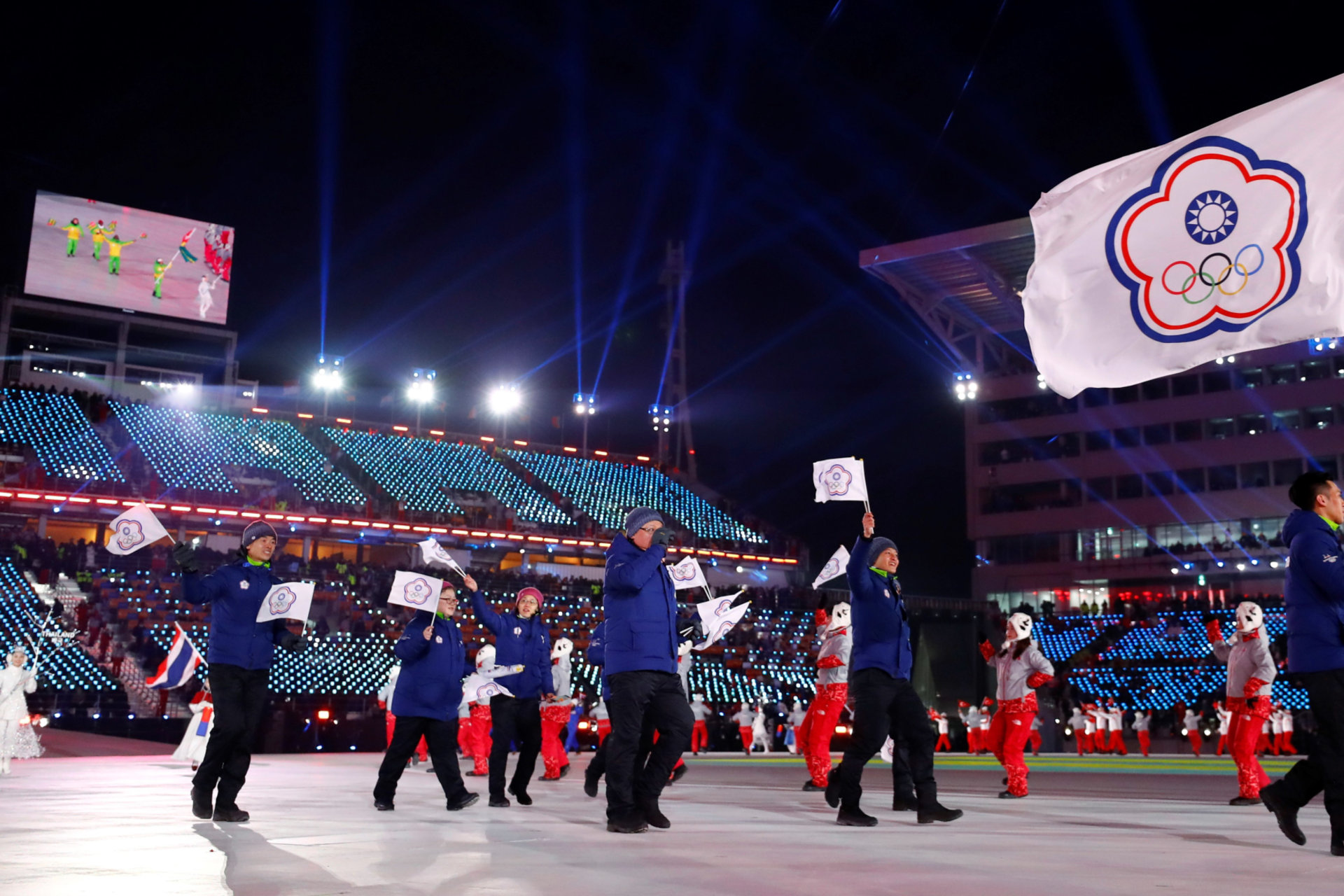 <p>Te-An Lien of Taiwan carries the national flag during the opening ceremony for the Pyeongchang 2018 Winter Olympics in South Korea, on February 9, 2018.</p>